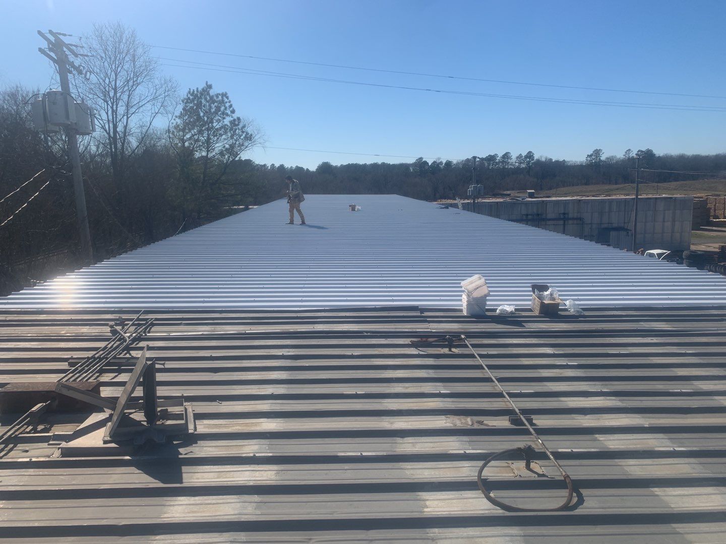 Commercial Roofing Installation using Aluminum Roofing panels by Hostetler Roofing