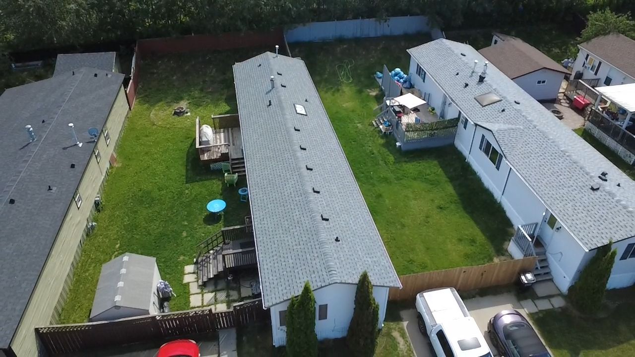 Silver Gray on Mystique  by 2thetop Roofing