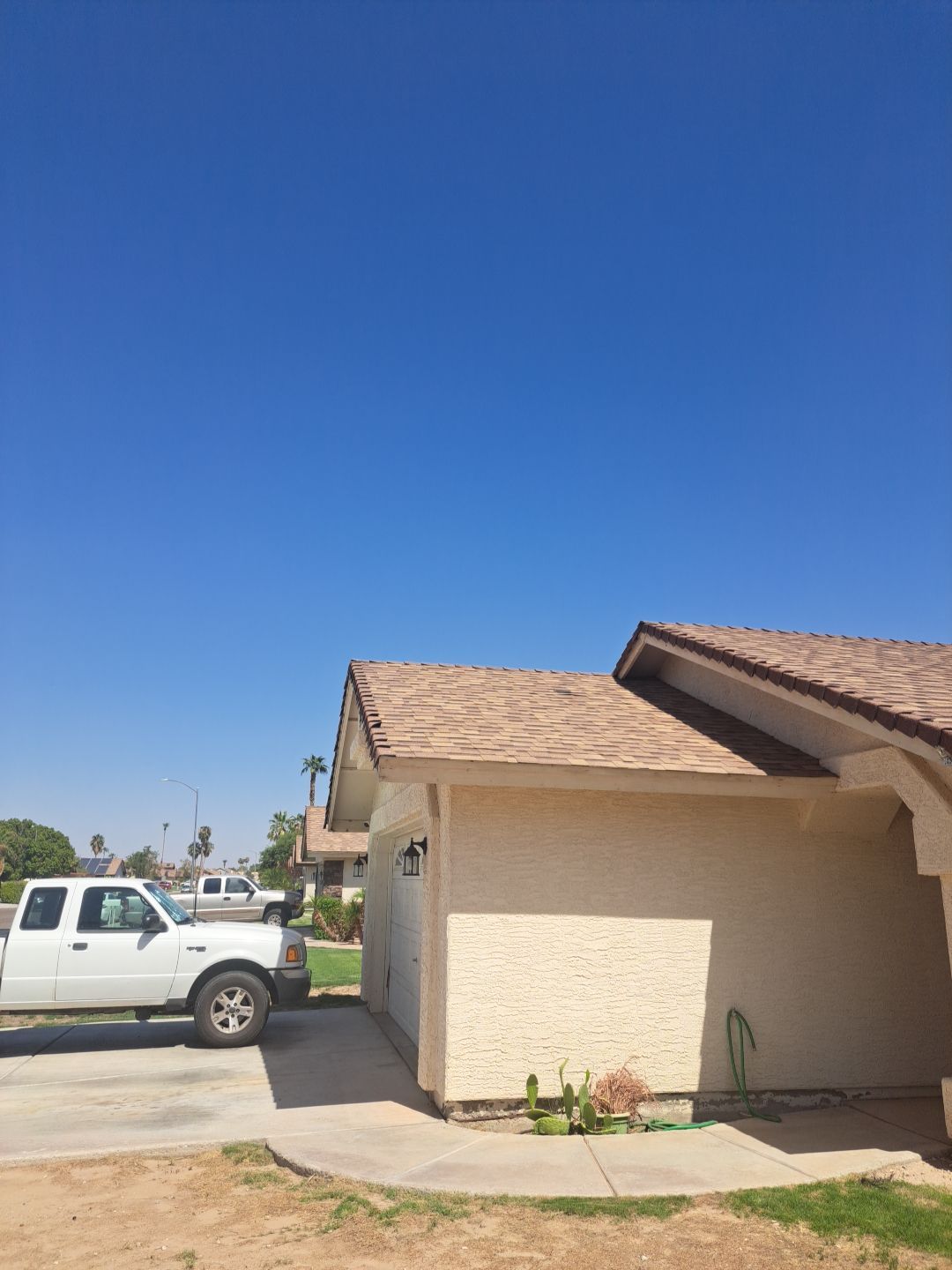 Desert Tan Shingles by Reimagine Roofing