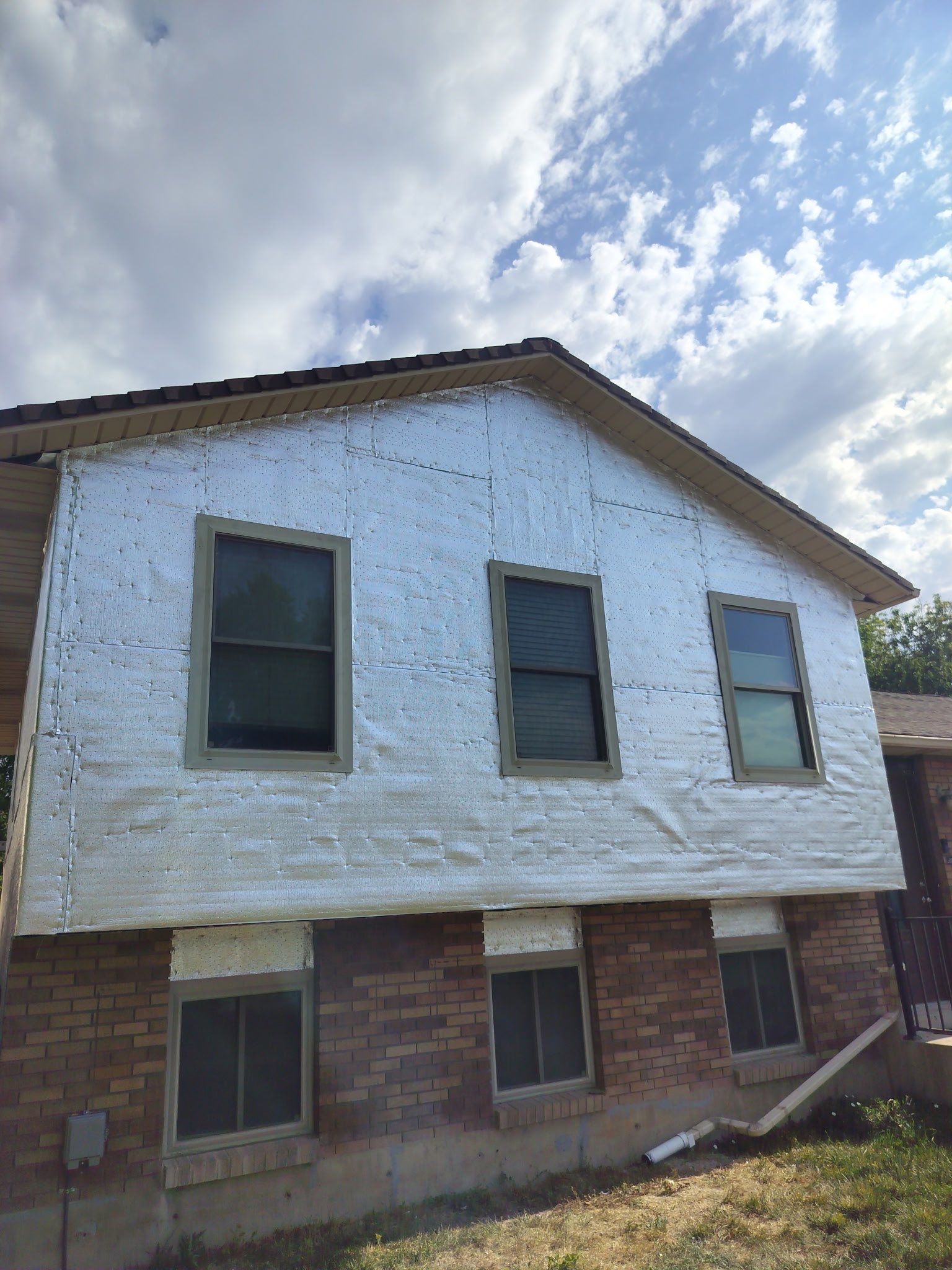 West Jordan | Hardie Lap Siding w/ Brick Accent | Boothbay Blue & Cobble Stone by Ideal Siding Utah