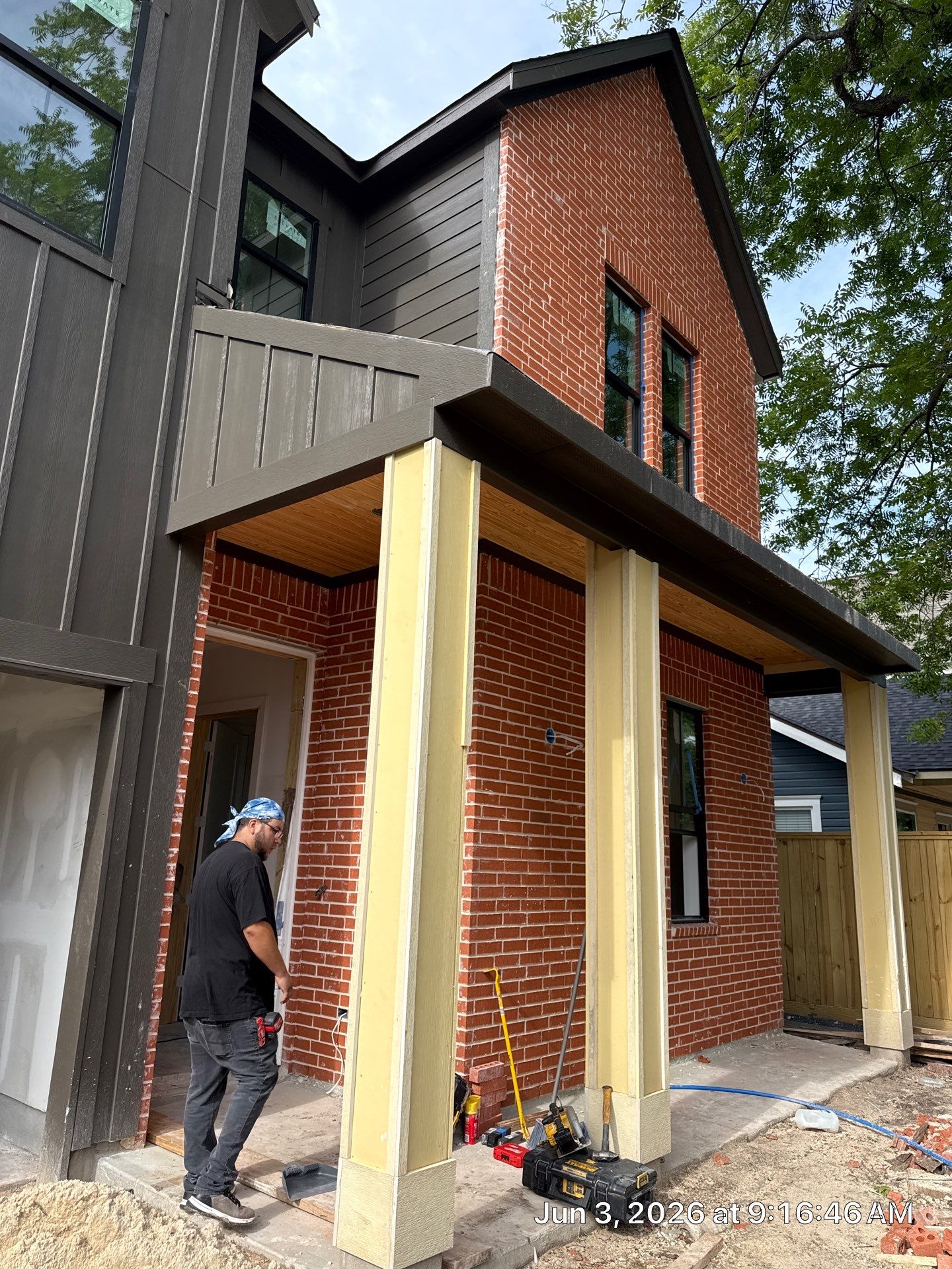 Midtown Elegance: Brickwork with Slurry Finish Refinement by Apex Conventional Stucco Llc