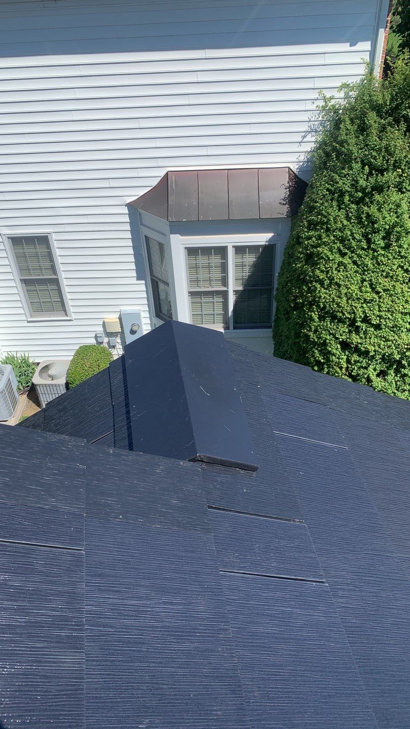 Tesla Solar Roof Replacement using Tesla Solar Roof V3 tiles by American Home Contractors