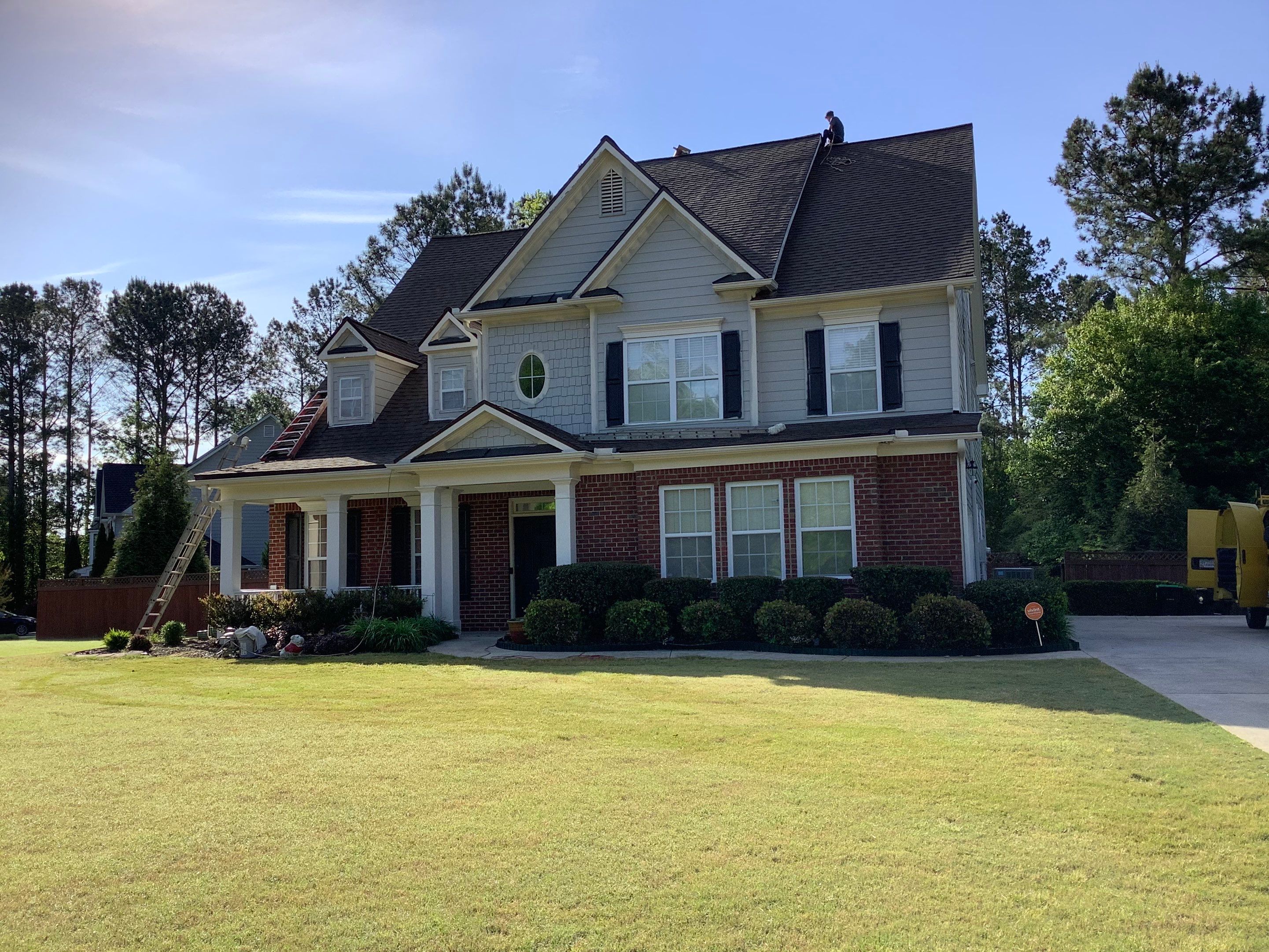 Exterior Home Refresh in Powder Springs with Gray Siding and White Trim by Swift Home Renovations