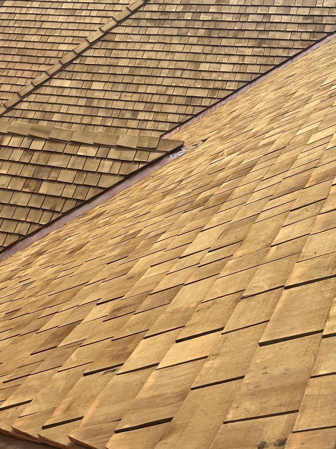 Residential Roofing Installation using Cedar Shakes by CMNG LLC