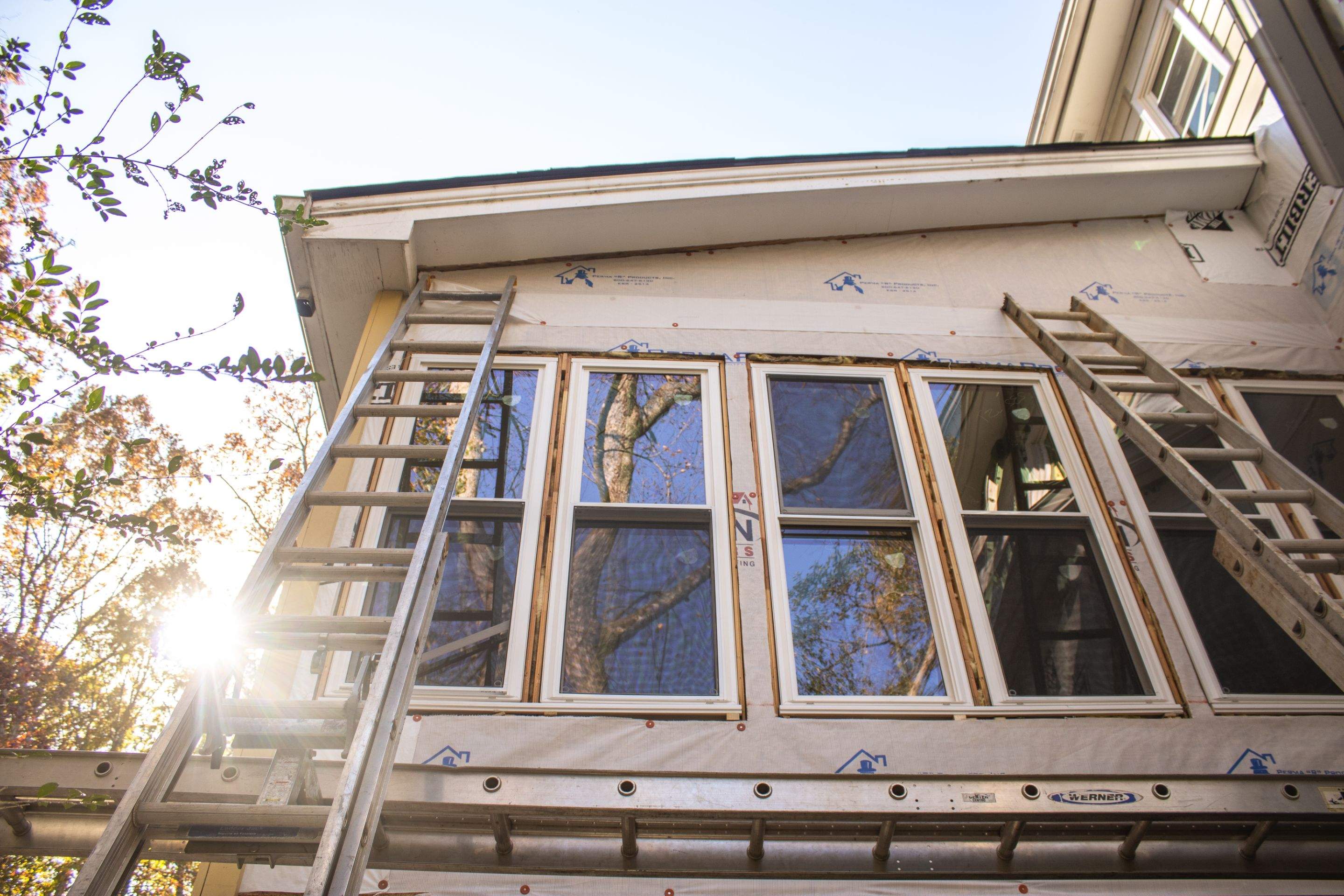 53 Window Replacements with Master 2800 Series Vinyl Replacement Windows and James Hardie Siding Installation by Nelson Exteriors 