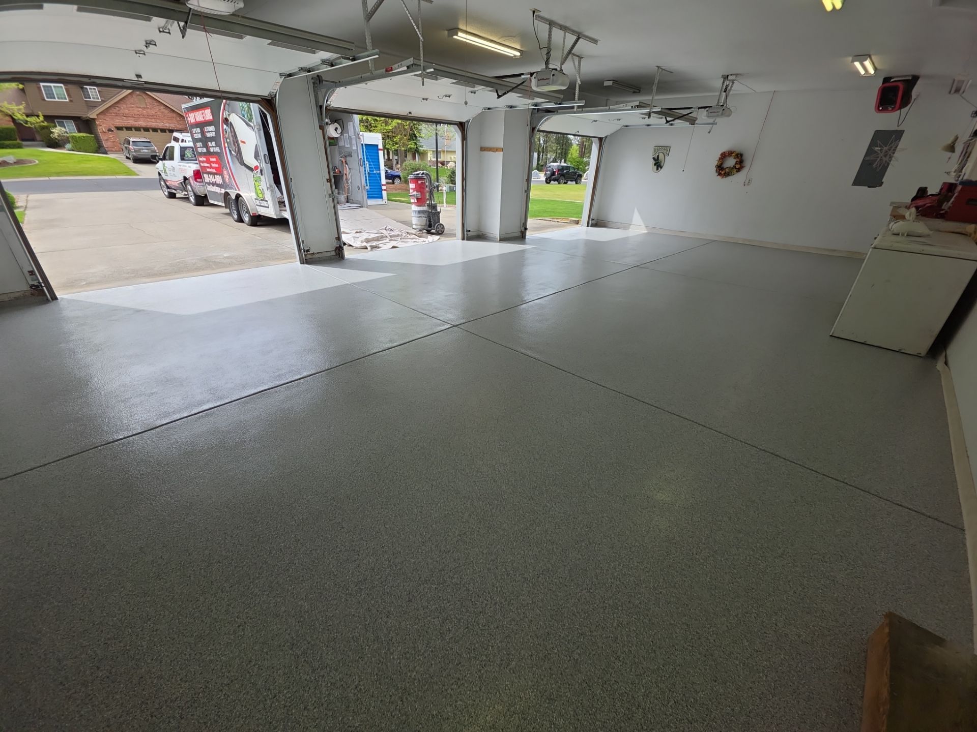 Garage Transformation using 1/8 Tidal Wave by Croc Coatings, LLC