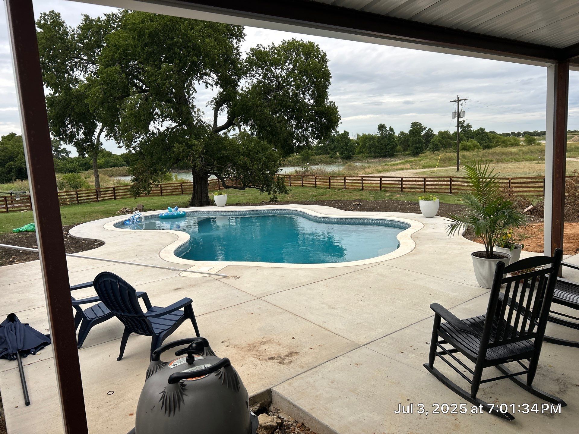 Freeform Pool with Tanning Ledge by Pinnacle Pools and Spas - DFW