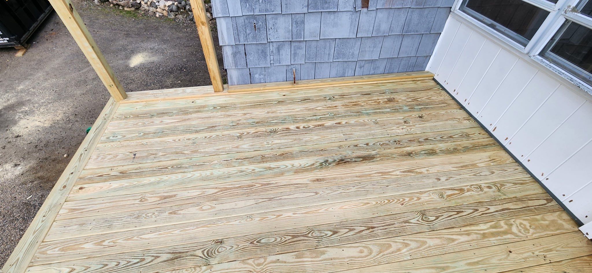 Moultonborough, NH – Pressure-Treated Deck Installation by Tall pine roofing