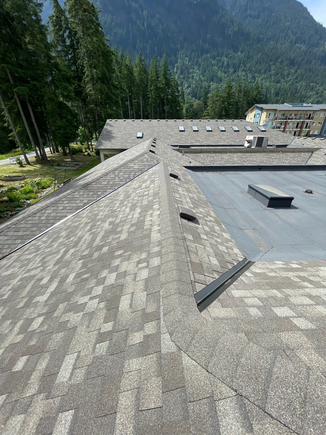 Residential ReRoofing Installation using OC Oakridge shingles by Top Notch Roofing Inc