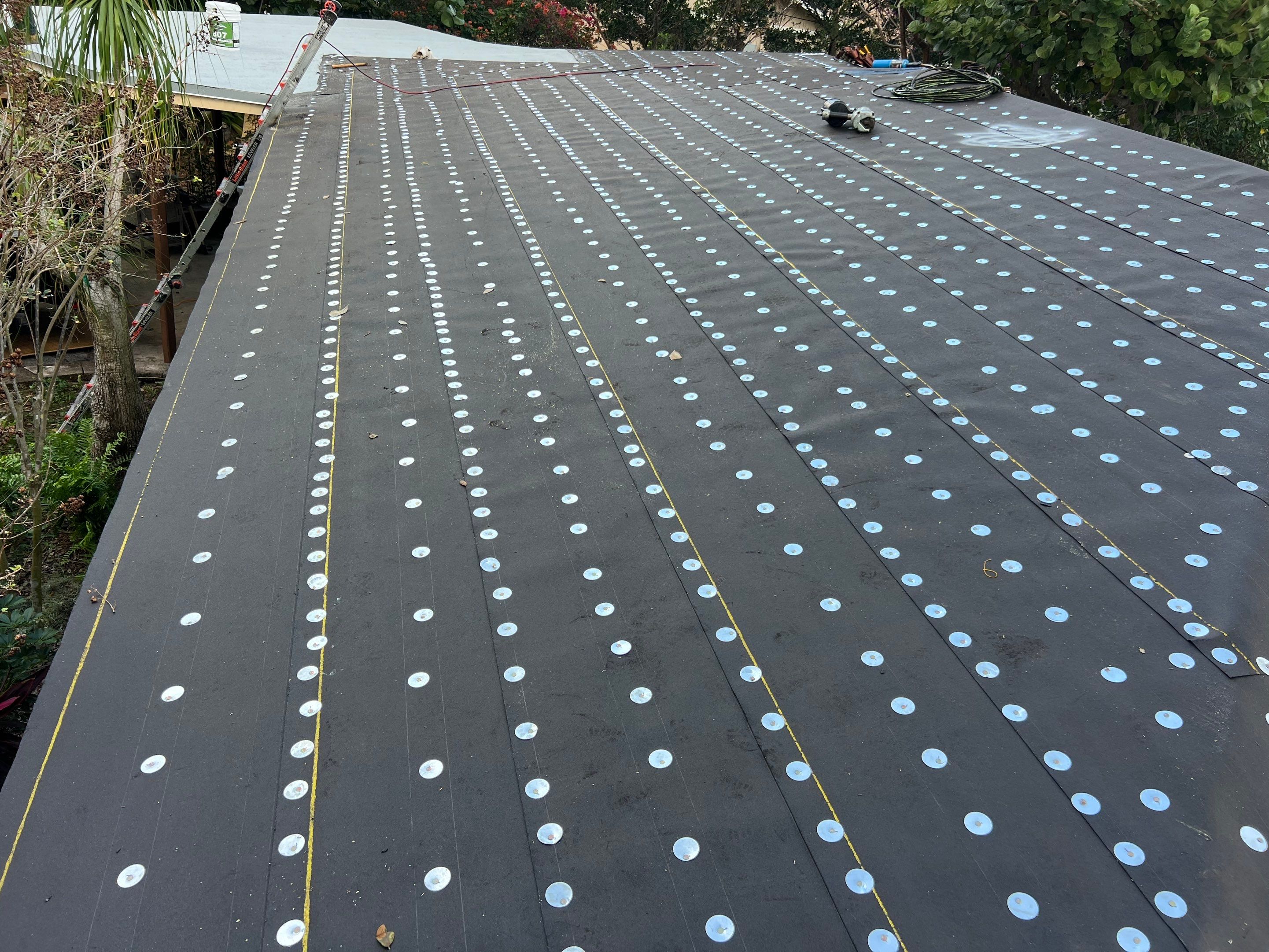 Residential Roofing Installation using 1" Nail strip metal roof by BLUES BROTHERS ROOFING