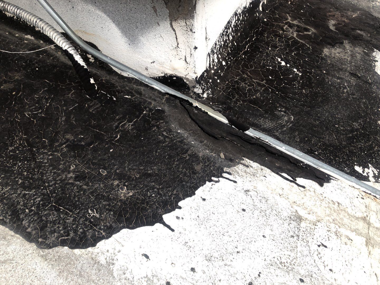 Spray foam and coatings using Conklin Benchmark/PUMA XL coatings and spray foam by Straight Edge Roofing Inc