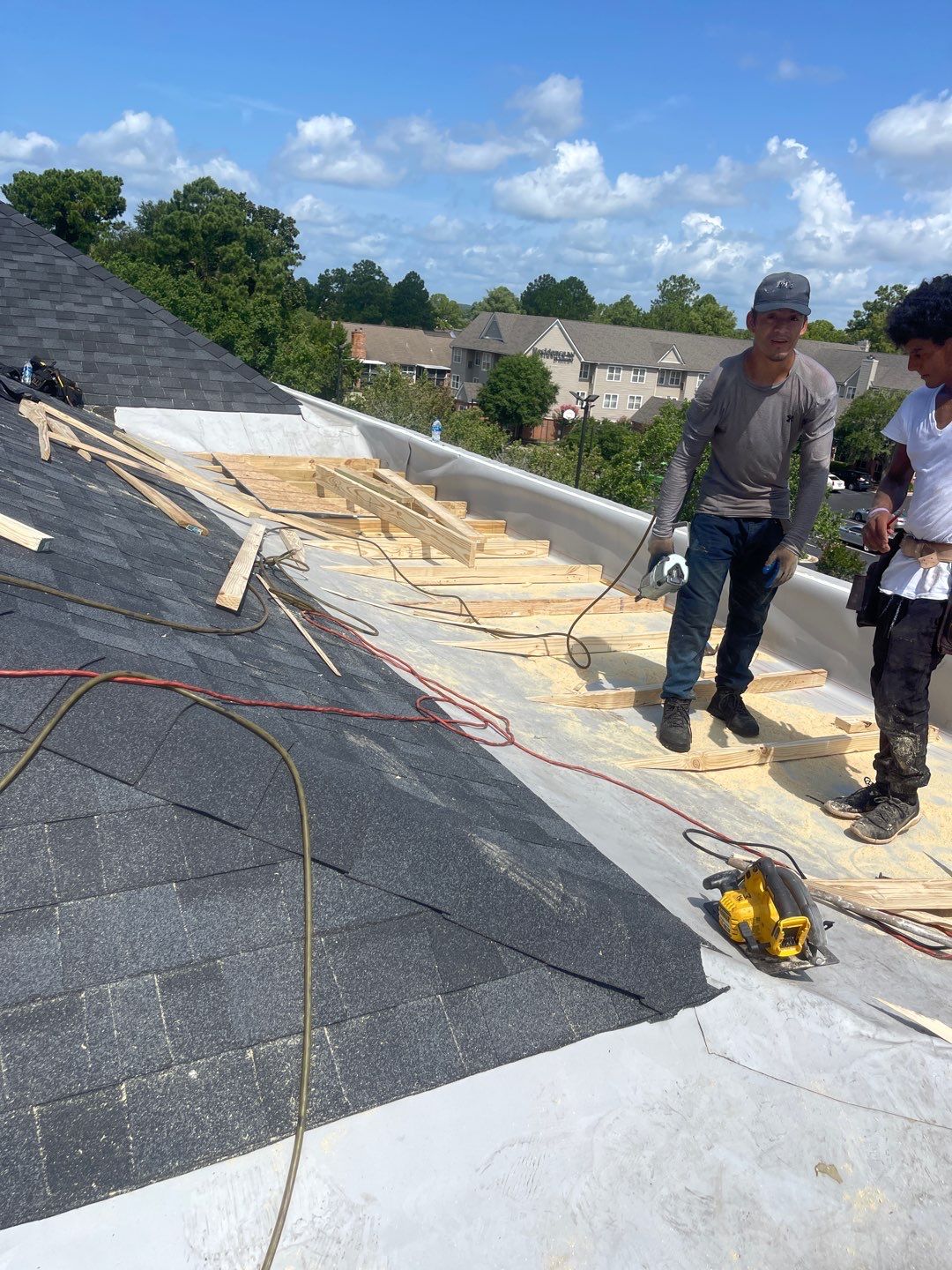 Commercial Roofing Installation using Roof Replacement by American Roofing & Construction LLC