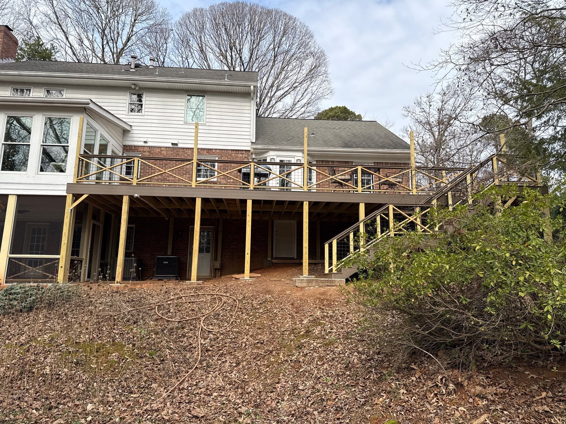 Deck Build and Screened-In Porch Install with Wild Hog 6' Black Mesh Panel Railing by Nelson Exteriors 
