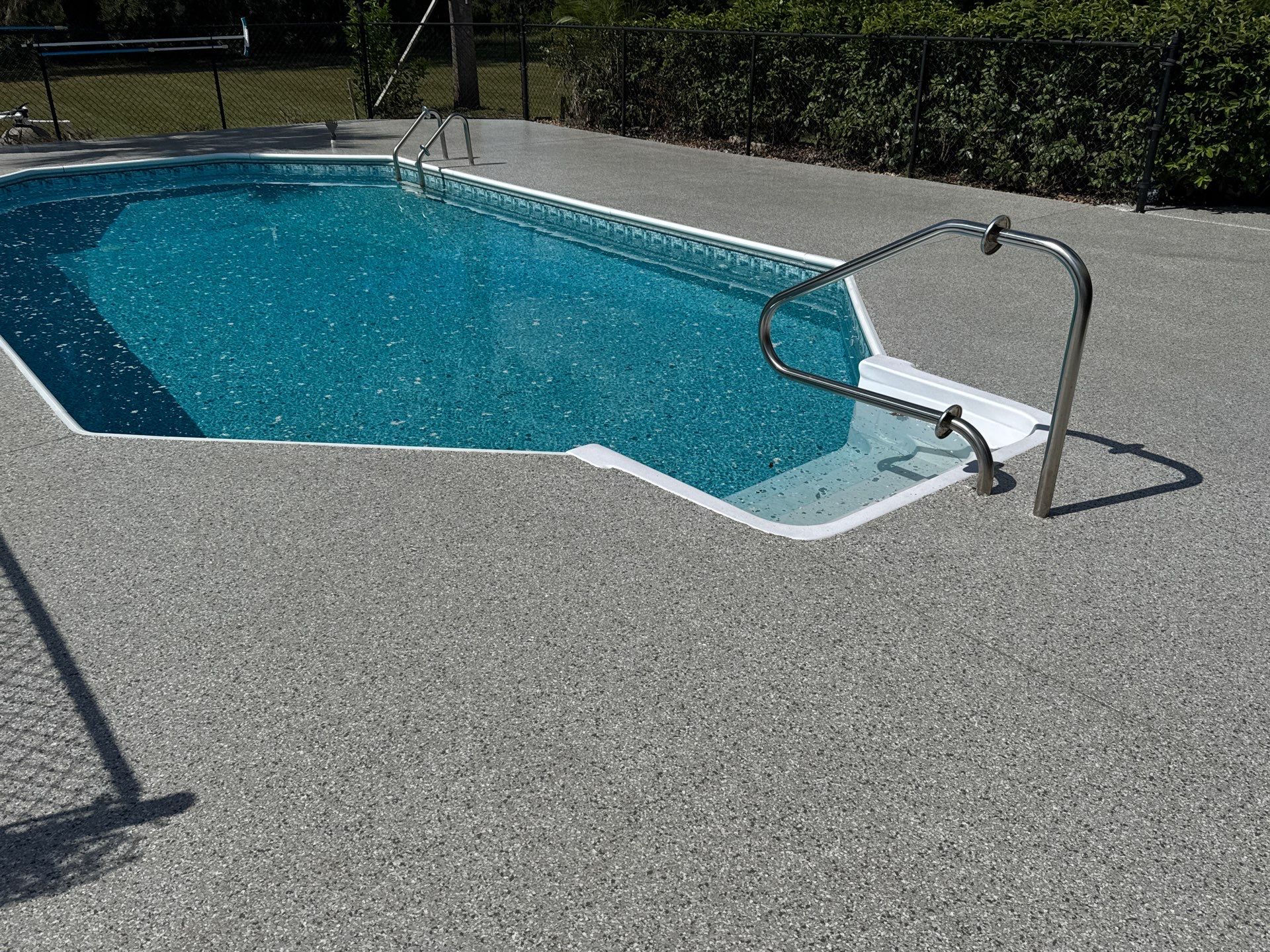 Pool Deck in Lake City, FL in Mount Everest by Cross Creek Concrete Coatings