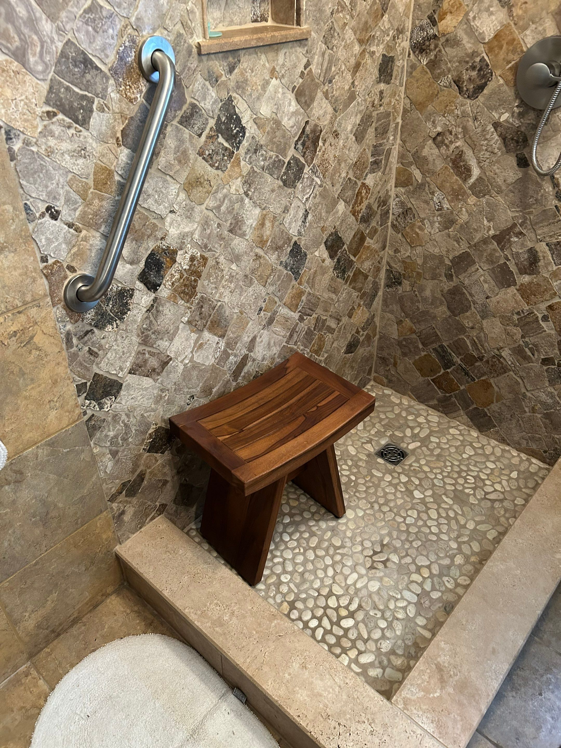 Natural Stone Shower Remodel and Pebble Floor Installation in Louisville by Footprints Floors Kentucky