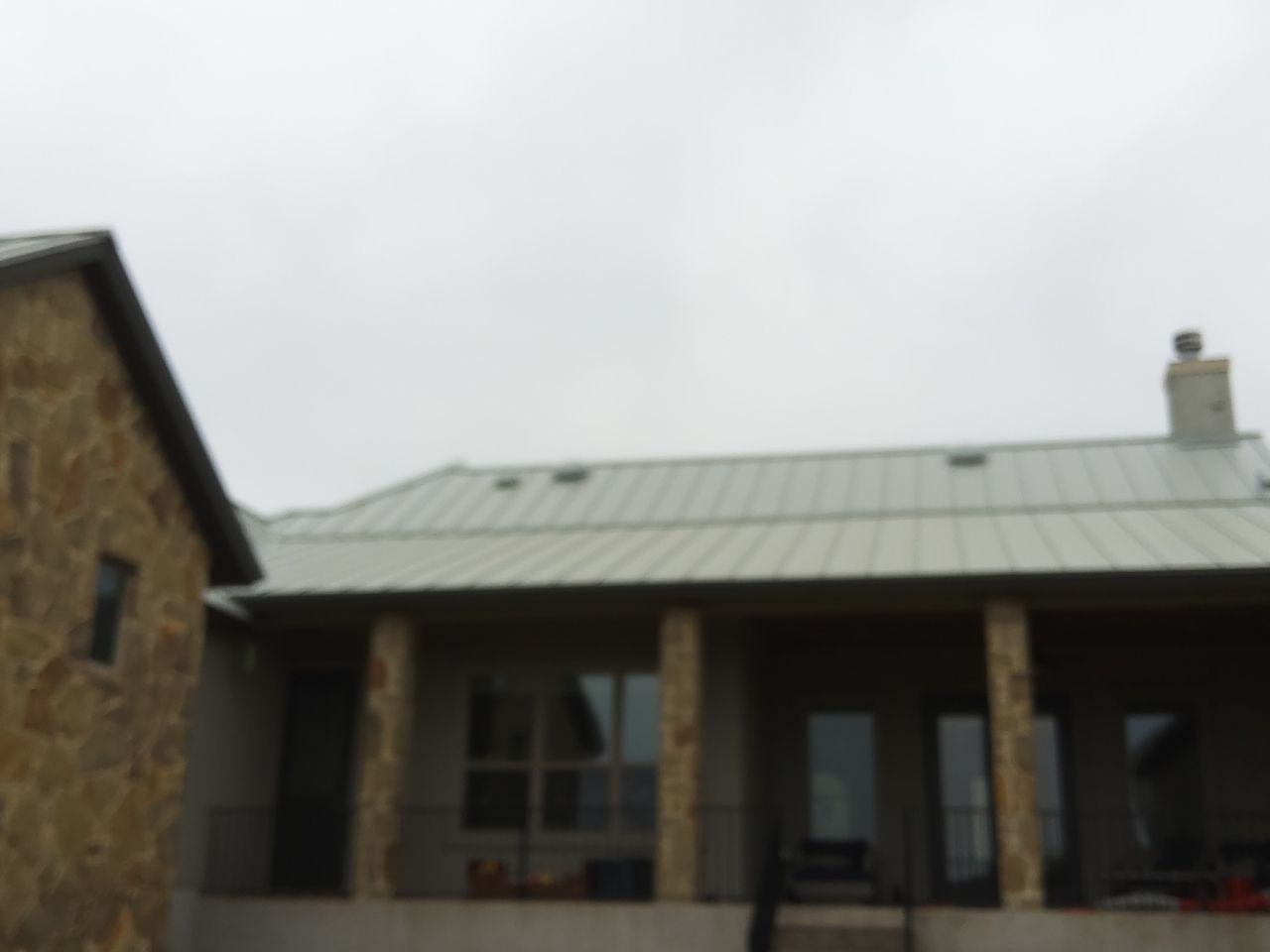 Residential Roof Replacement using 24 GA Double-Lock - Galvalume by Action Exteriors Austin