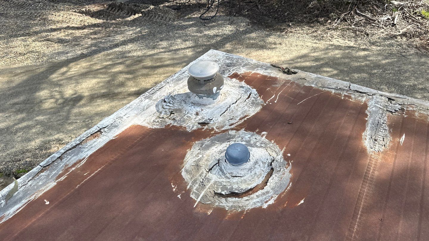 Foam and coatings on mobile home by Straight Edge Roofing Inc