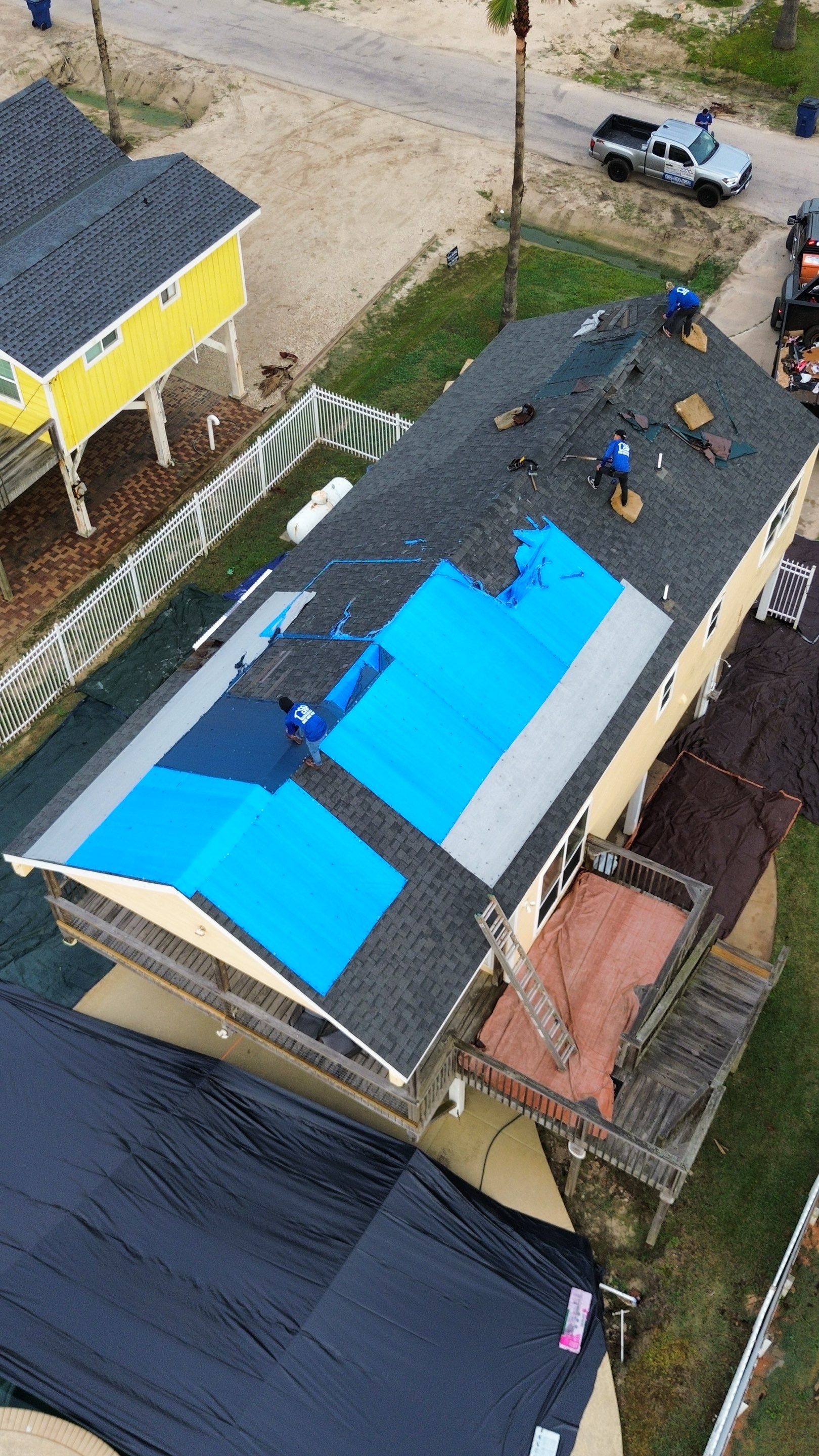 Roof Replacement using IKO Cambridge Dual Grey by CAP Roofing and Construction LLC