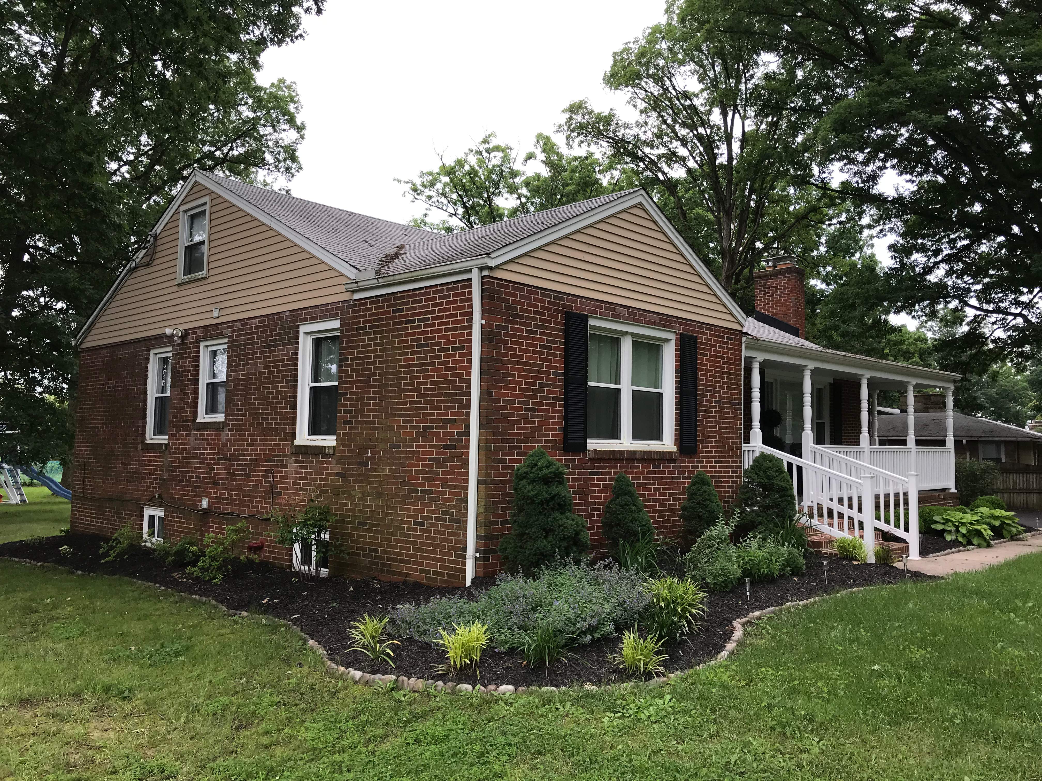 Residential Roofing Installation using Charcoal Black by Alpha Design Services