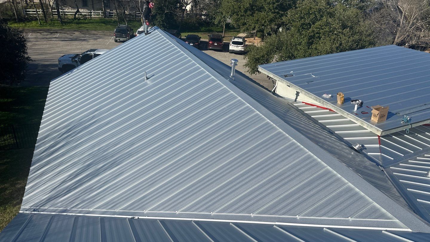 Commercial Roofing Installation using 24 GA Double-Lock - Galvalume by Action Exteriors Austin