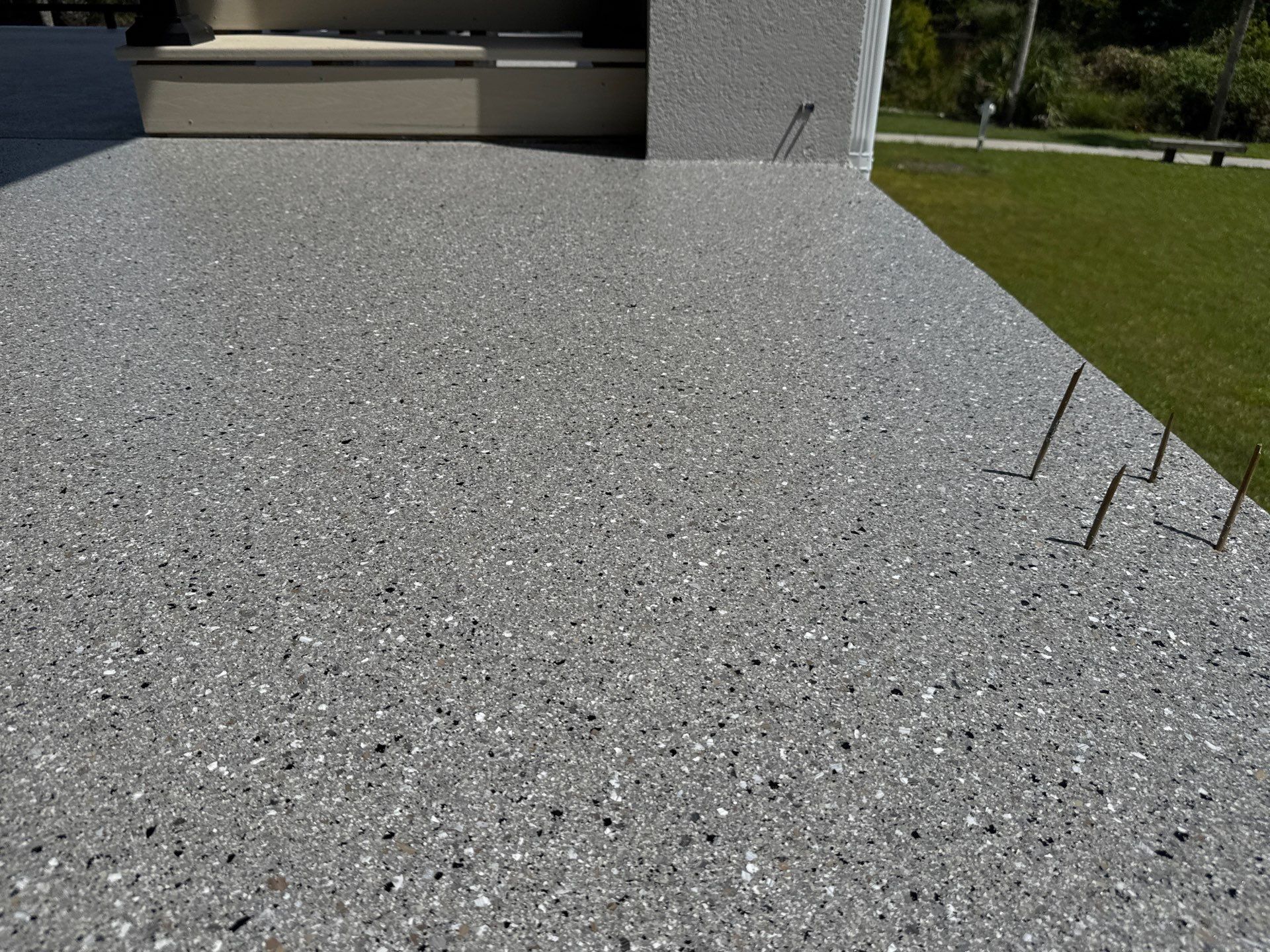 Under Side of Home in Hybrid Shale by Cross Creek Concrete Coatings