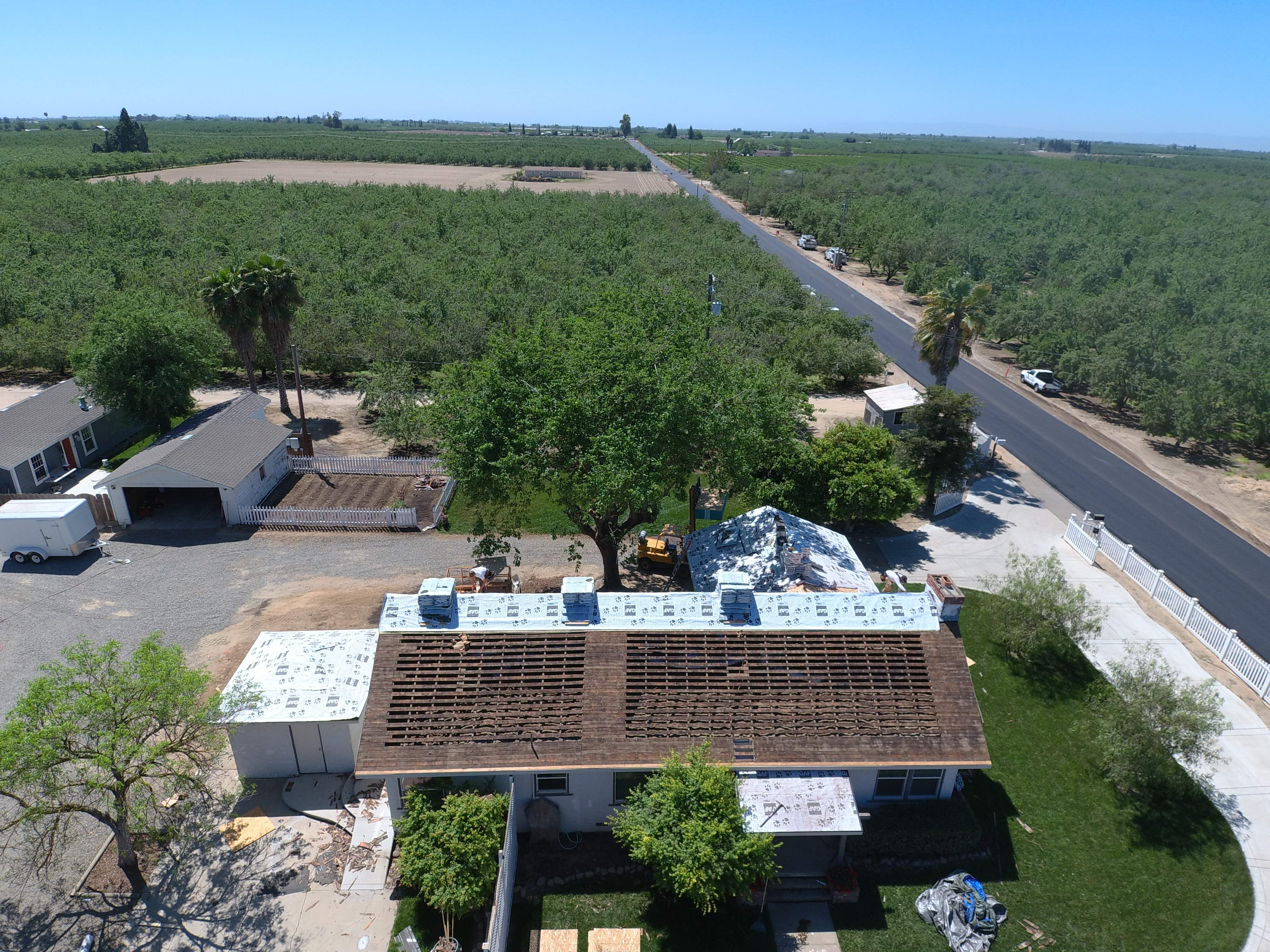 Residential Roofing Installation using Presidential type composition shingles by Straight Edge Roofing Inc