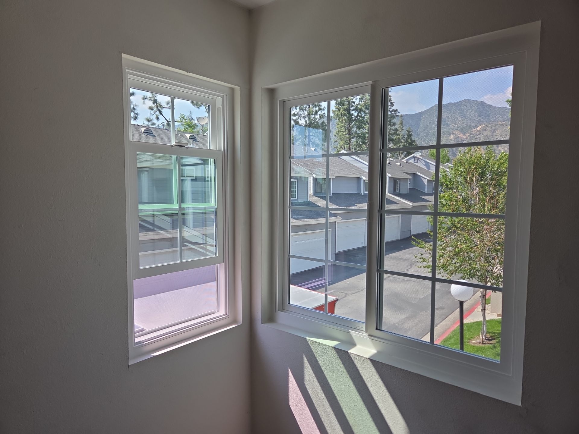 Window Installation using Milgard V300 Trinsic with grids by American Window Company