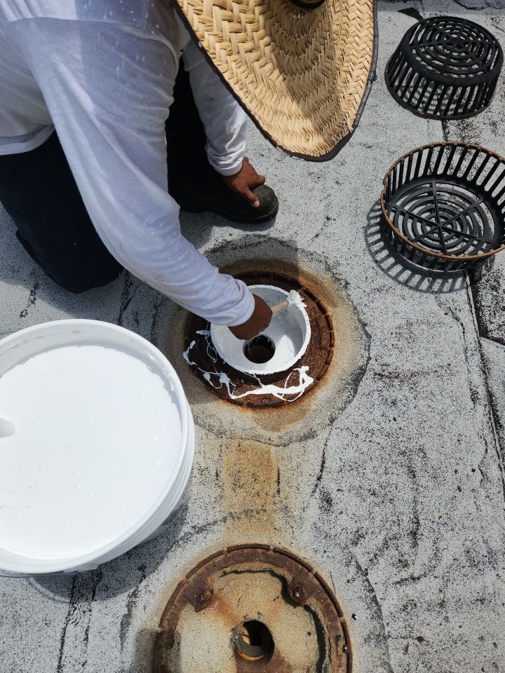 Flat Roof Silicone Coating and Drain Repair in Ocean Ridge by Aastro Roofing
