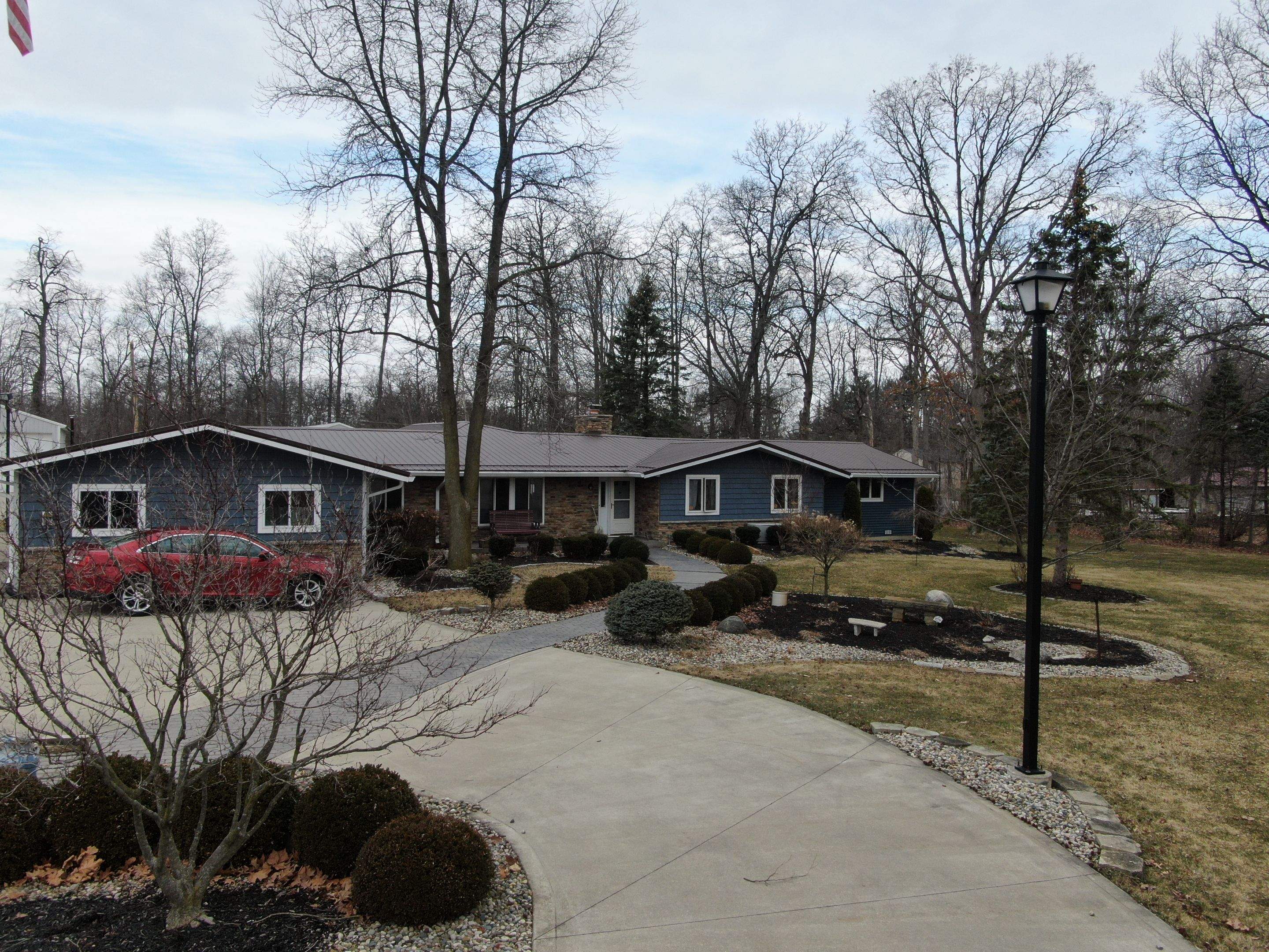 Residential Roofing Installation using Exposed Fastener Metal Roof by 4Ever Metal Roofing