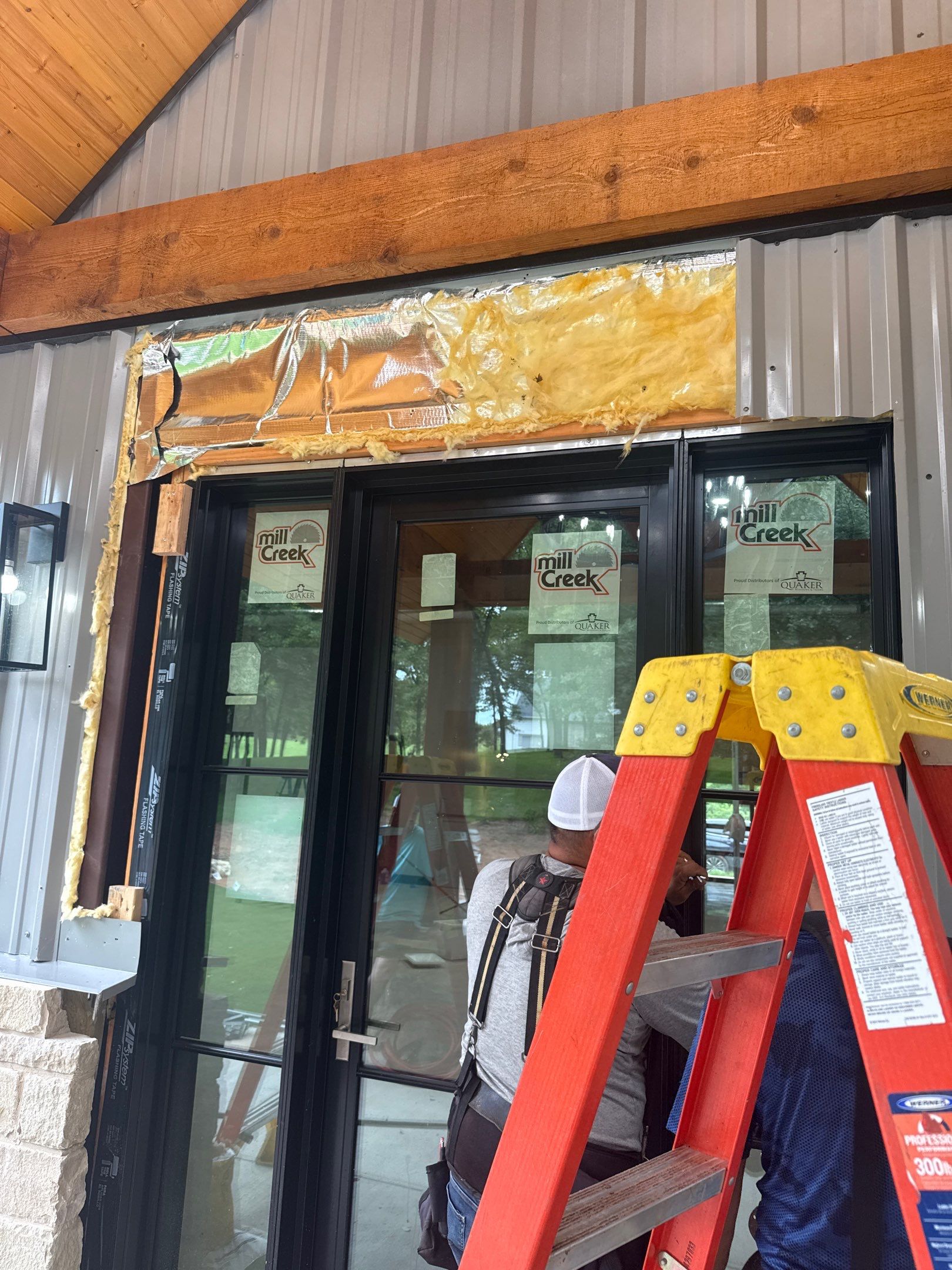 Front Porch Metal Canopy & Cedar Stain in Edmond, OK by 5Coat Roofing & Construction