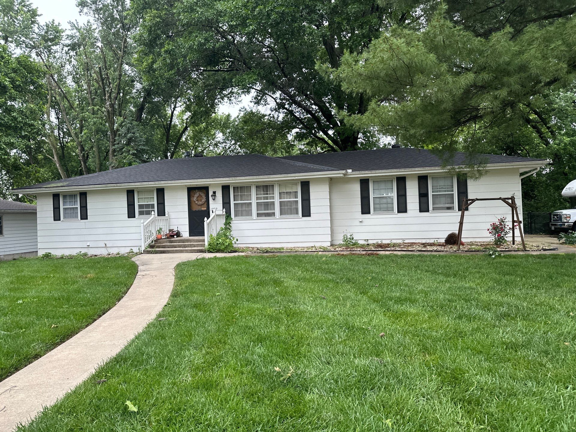 Asphalt Shingle Roof Repair After Tree Damage in Liberty by Liberty Roofing