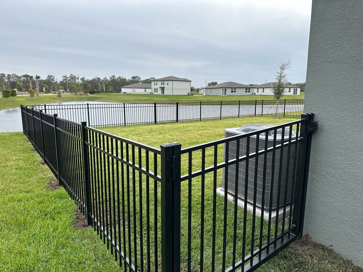 Aluminum Fence Installation using Black 3 Rail Aluminum Fence by Asap fence and gates, LLC