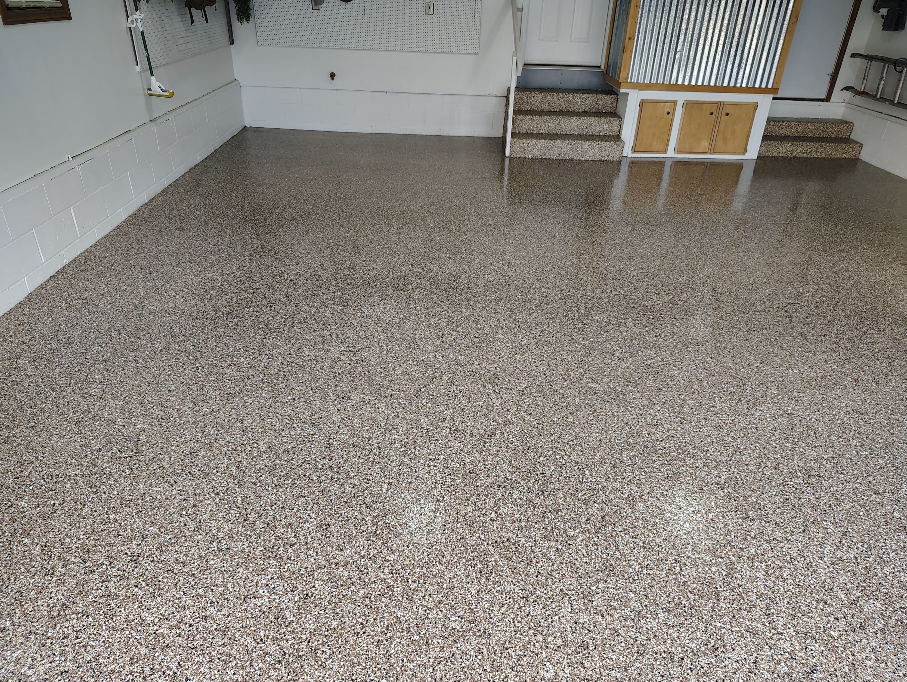 Multi-Colored Flake Epoxy Garage Floor Coating and Crack Repair by Select Painting, Coatings & Garage Cabinets