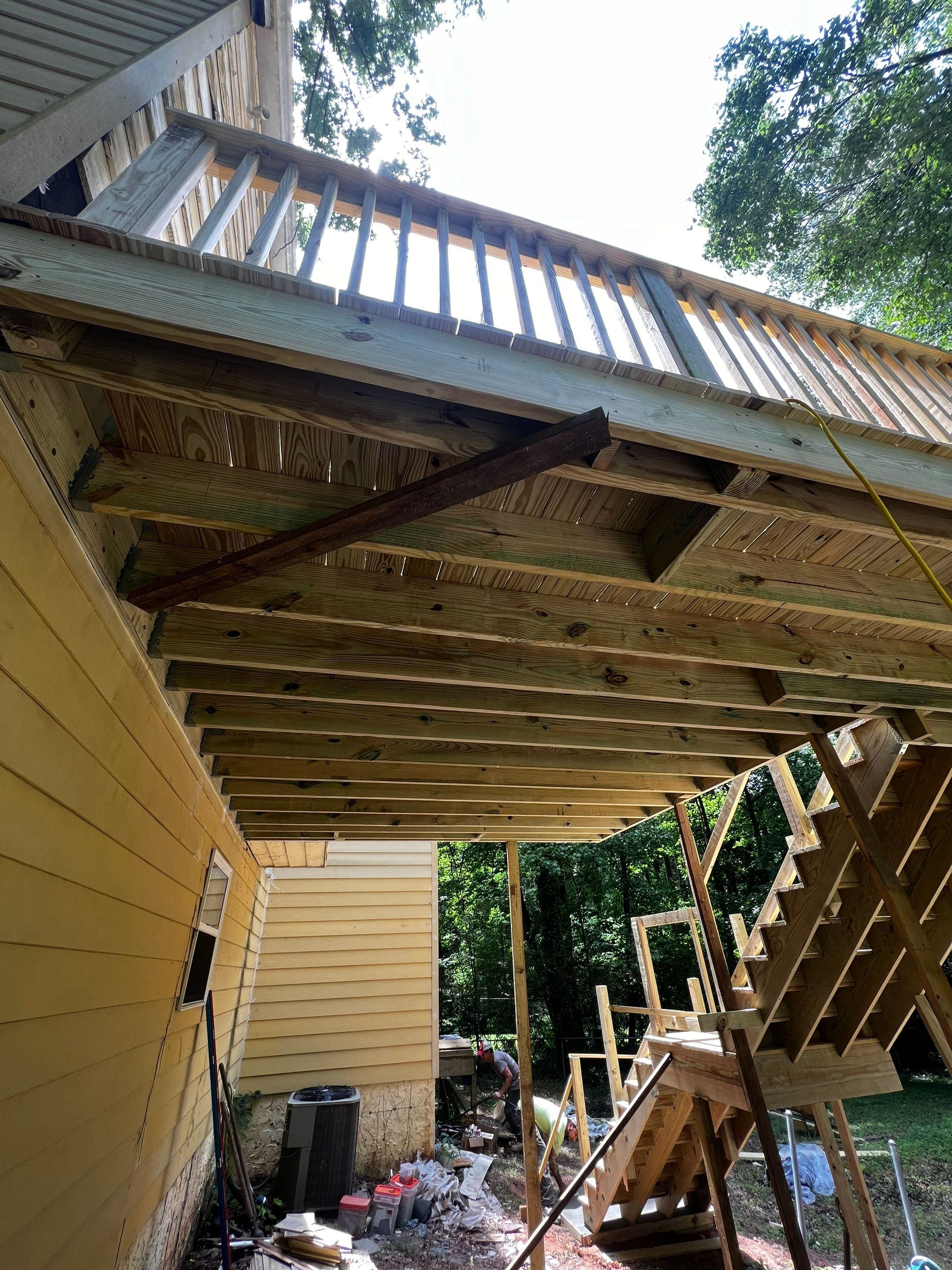 Elevated Wood Deck and Blue Lap Siding Installation in Kennesaw by Swift Home Renovations