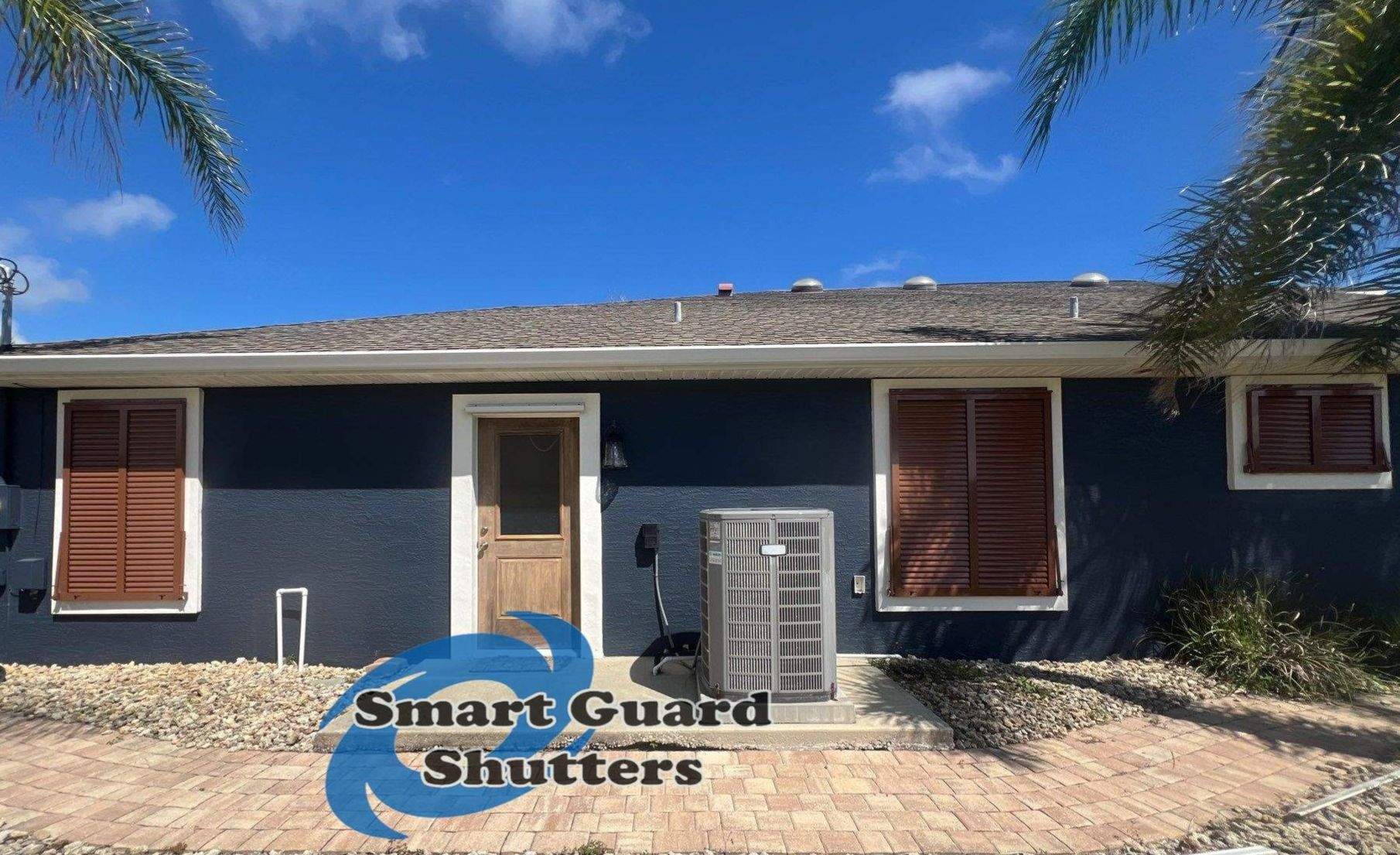 Impact Rated Bahama Shutters in Beige Brown by Smart Guard Shutters
