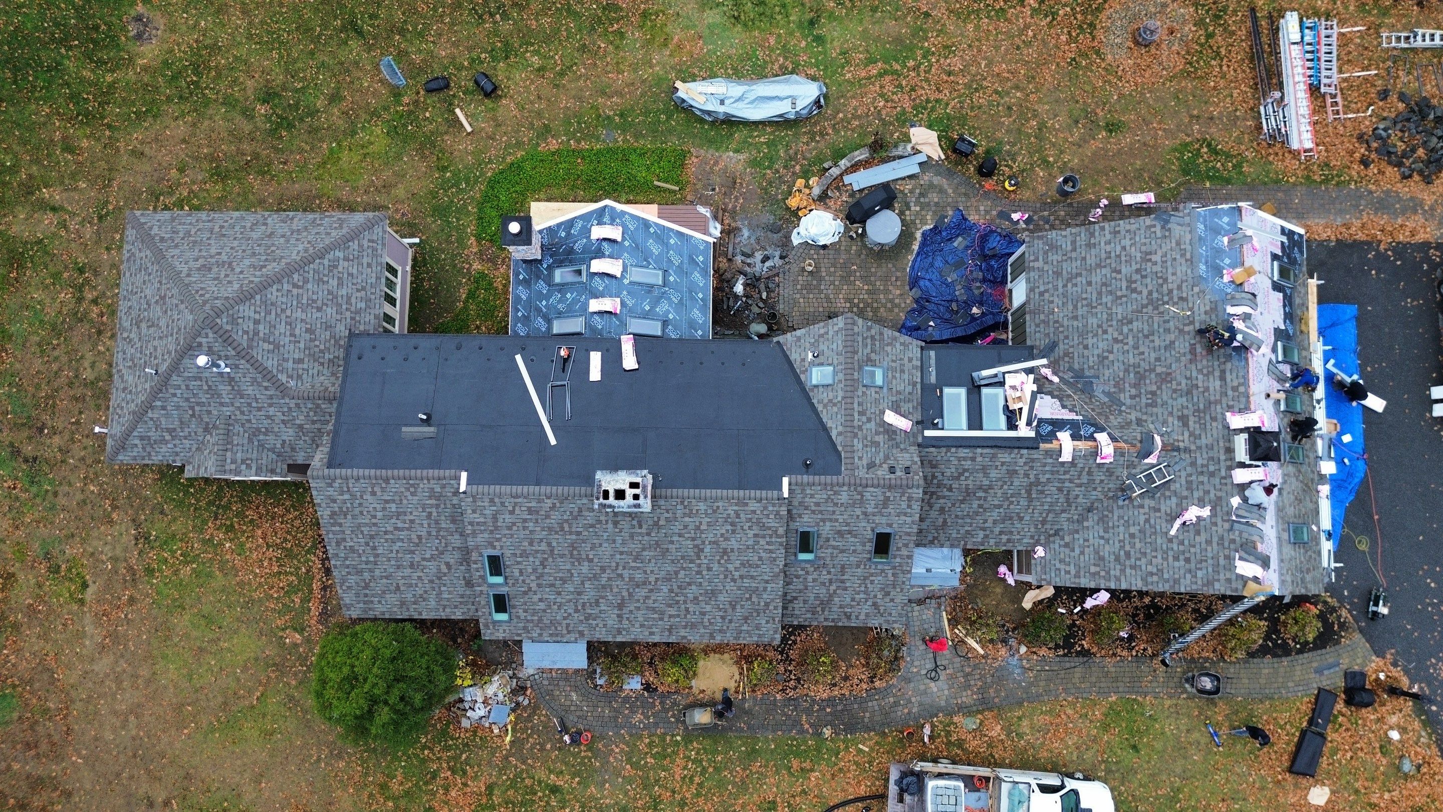 Complete House & Barn Roof with 13 Skylight Reflashing + EPDM Repairs by Mighty Dog Roofing of Greater Middlesex County