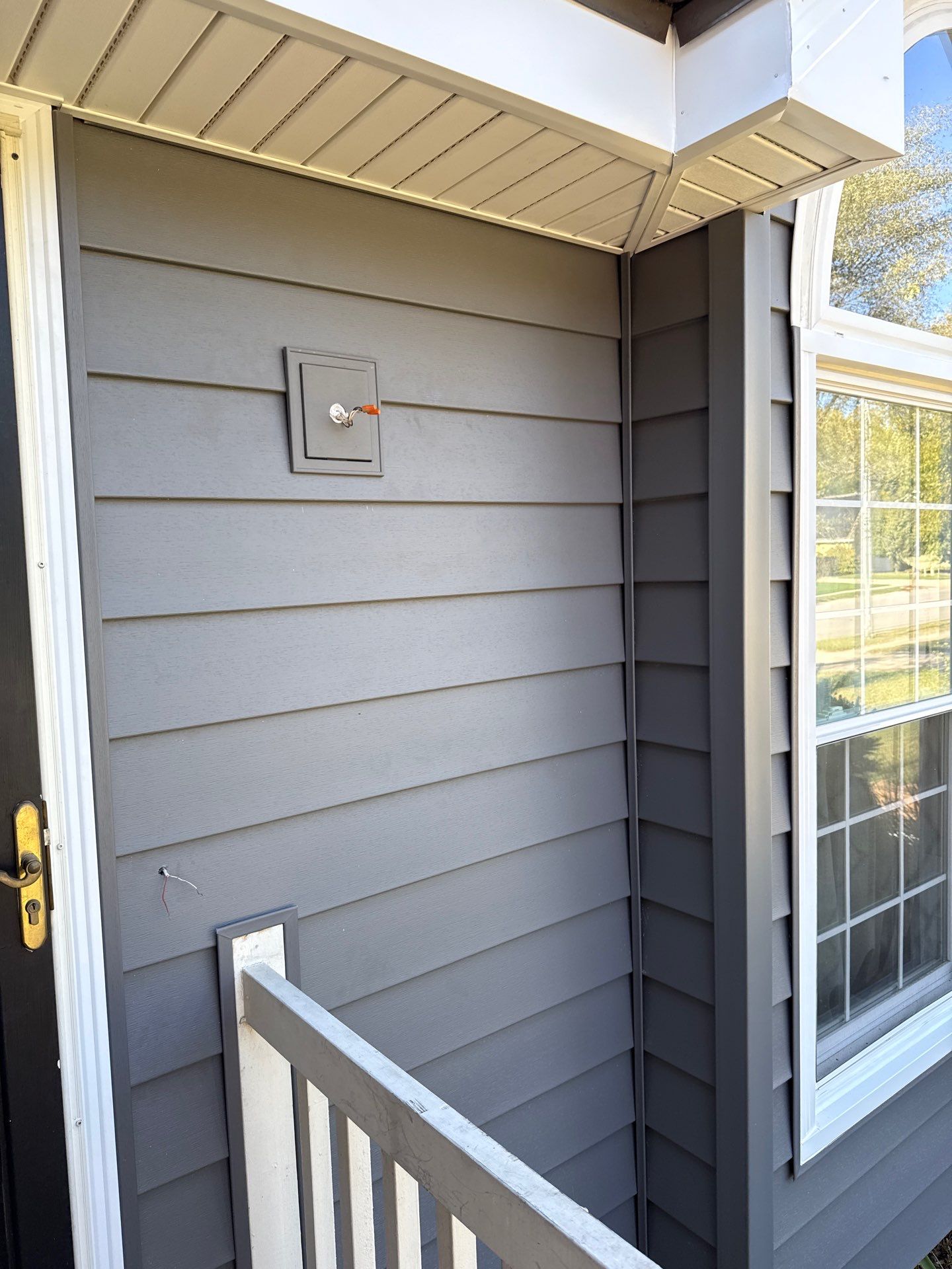 Split Entry in Smokey Ash Craneboard D7 by EEC  Windows, Siding & Roofing 