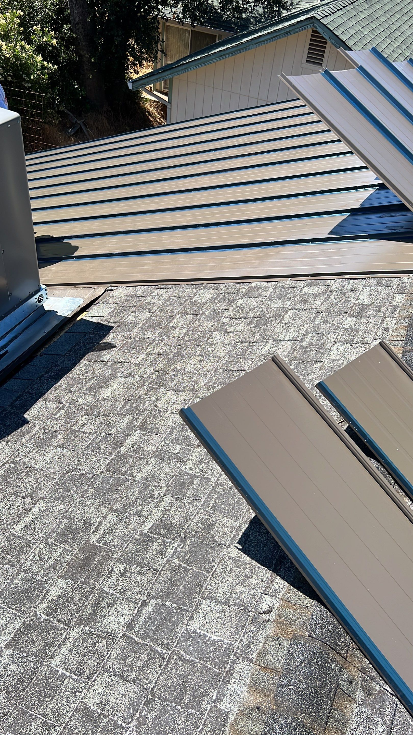 Metal roofing installation using ASC Standing Seam metal by Straight Edge Roofing Inc
