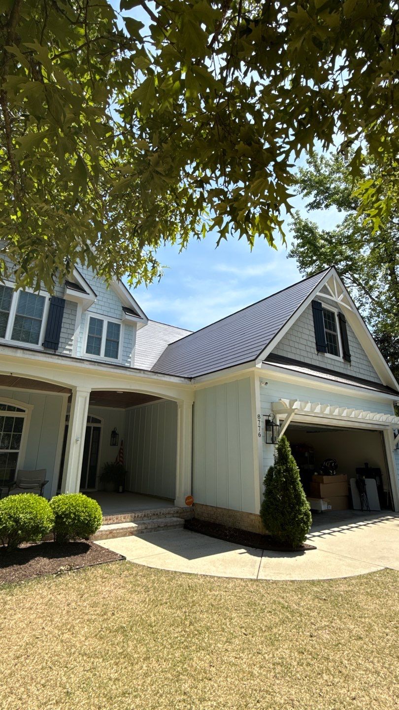 Roof replacement using GAF TimberSteel by American Home Contractors