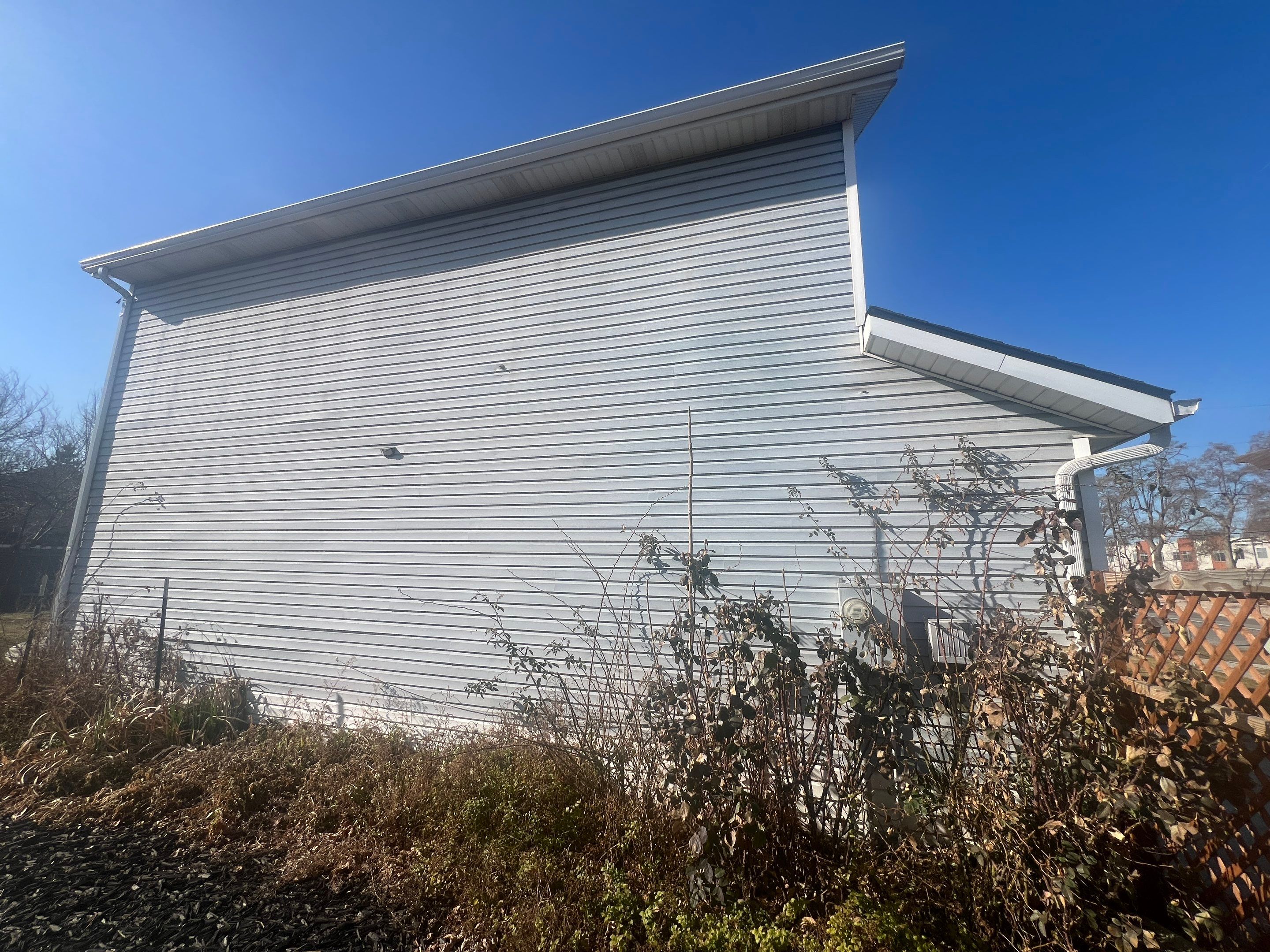 Salt Lake City | Premium Insulated Vinyl & Mixed Materials | Crisp White & Black by Ideal Siding Utah
