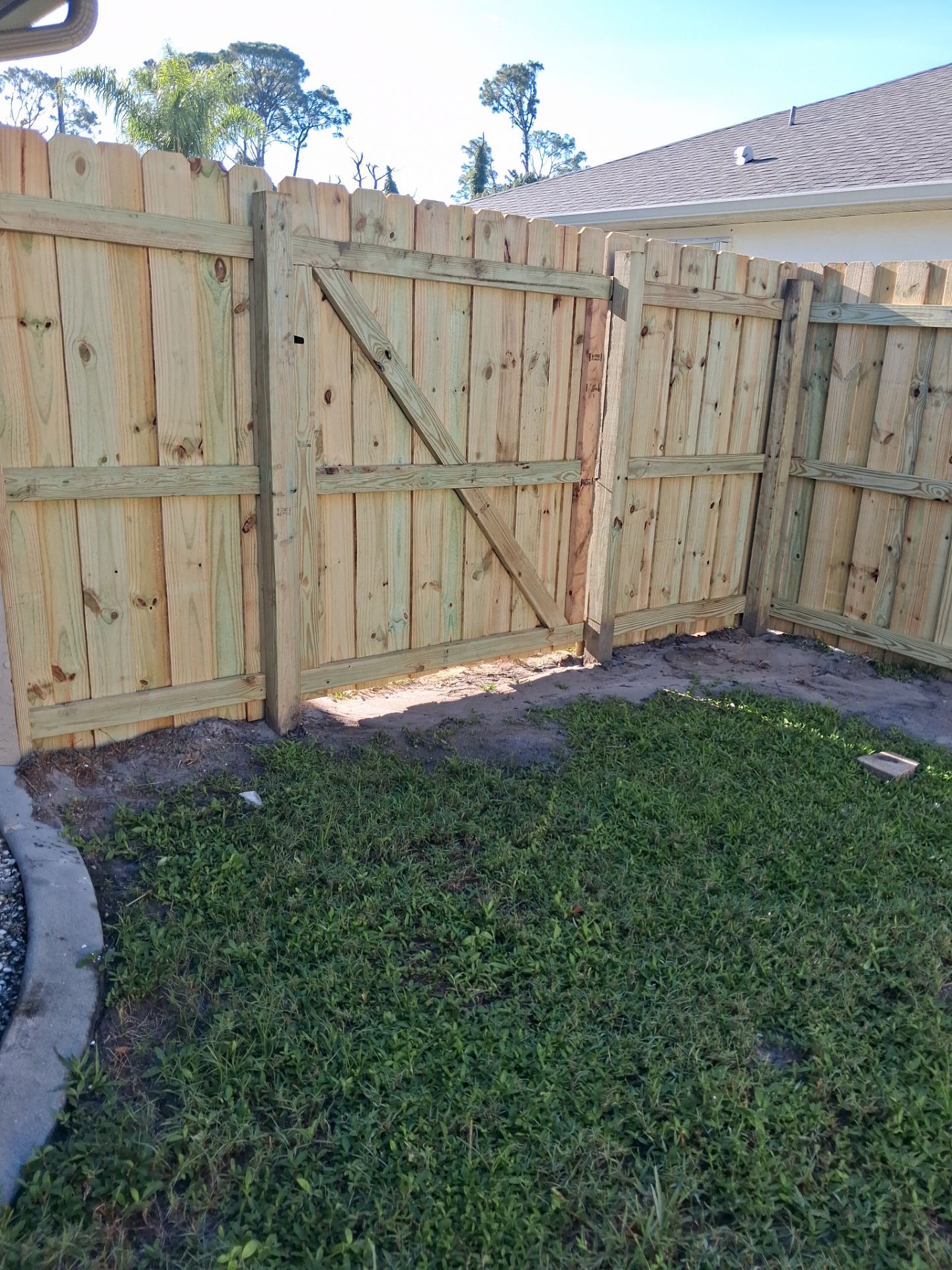 Pressure-Treated Wood Privacy Fence and Gate Installation in North Port by True Fence LLC