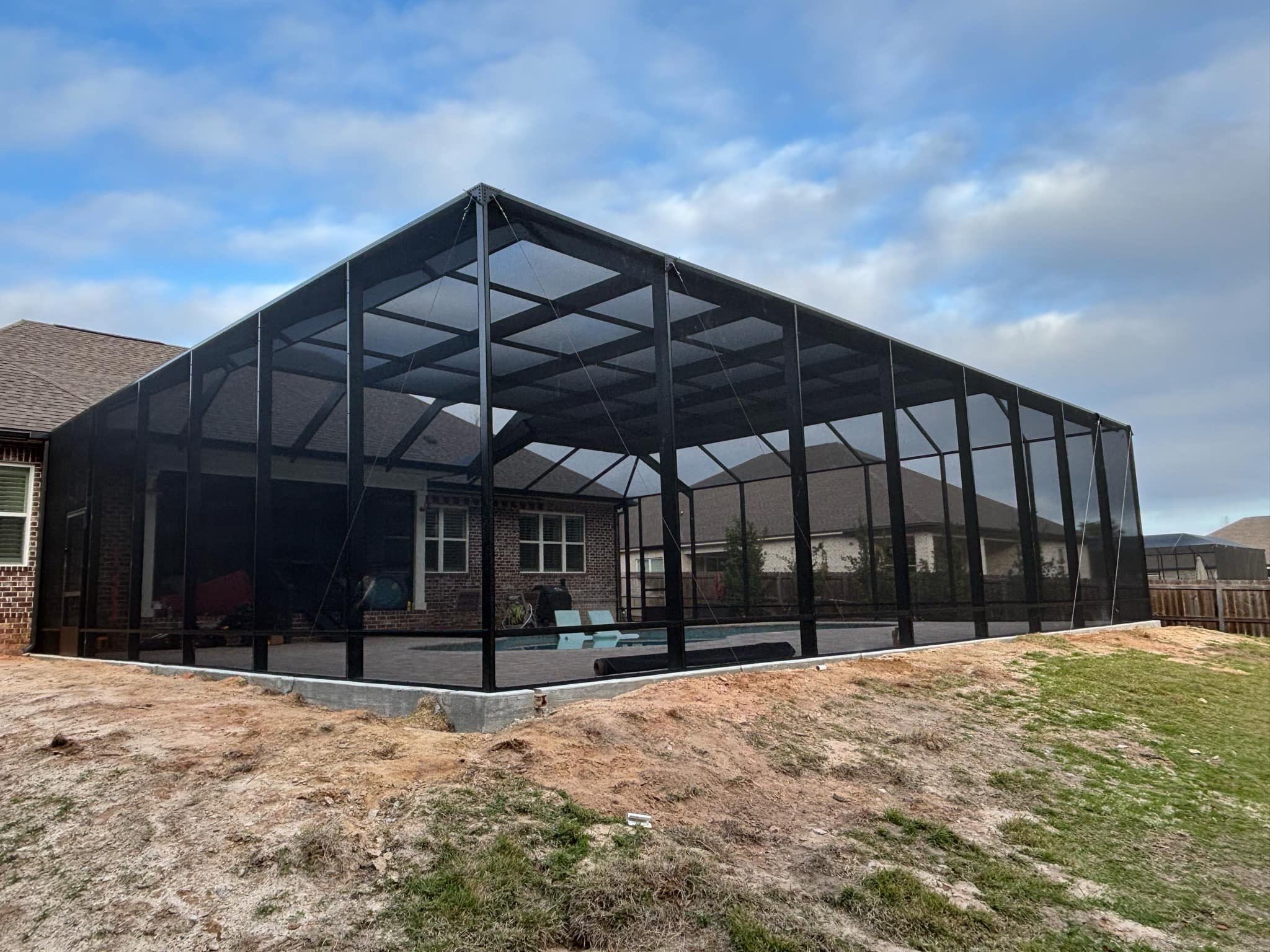 Titan Pool Cage in Baker, FL by Titan Sunrooms