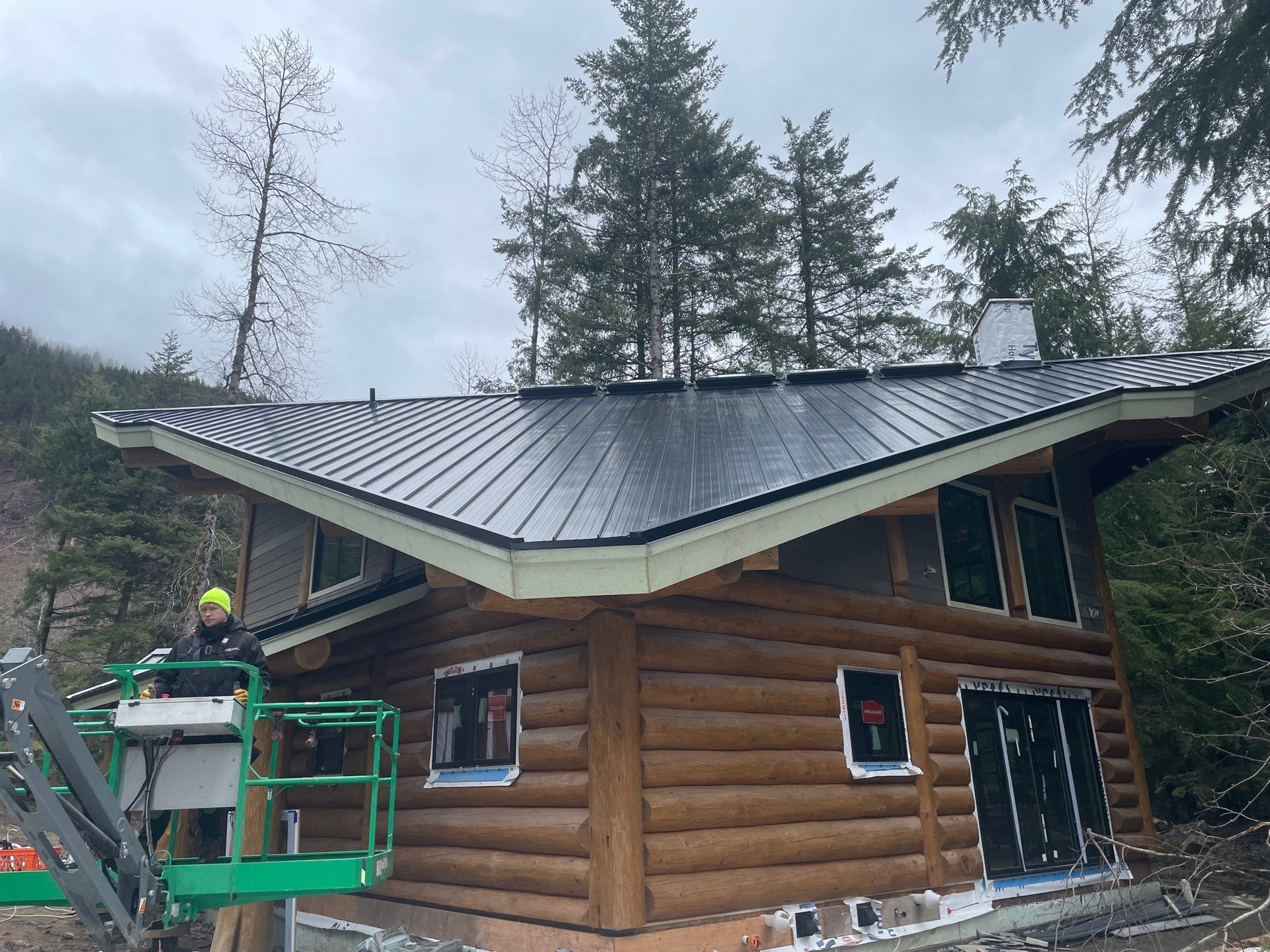 Residential Roofing Installation using 12" Prolok metal  by Top Notch Roofing Inc