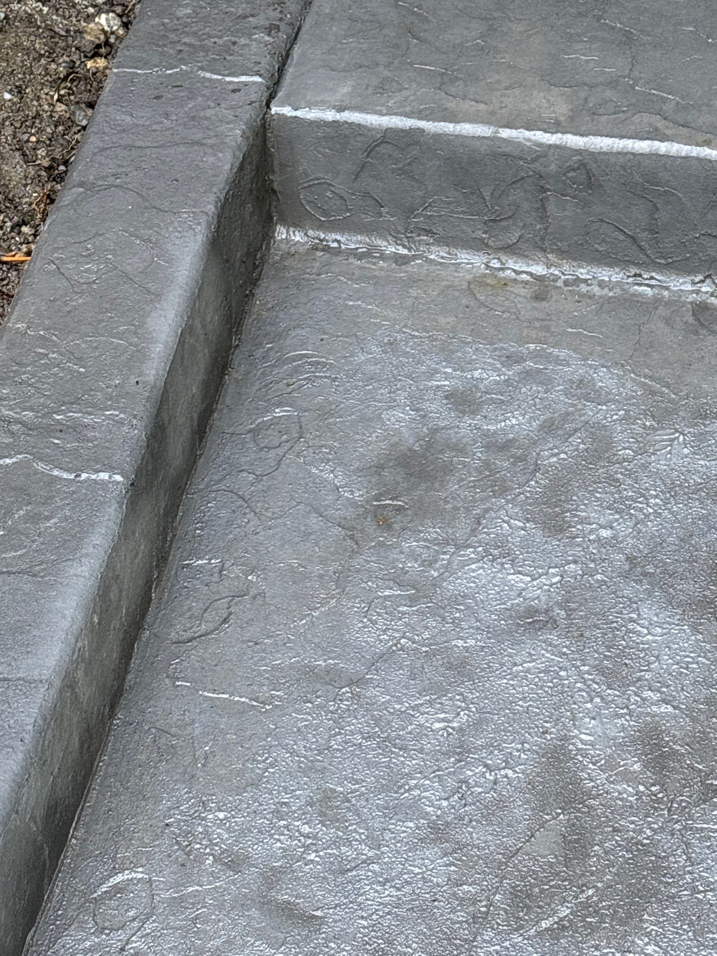 Multi-color Stamped & Sealed Concrete Driveway Renovation | Mukilteo by Jireh Asphalt & Concrete Inc