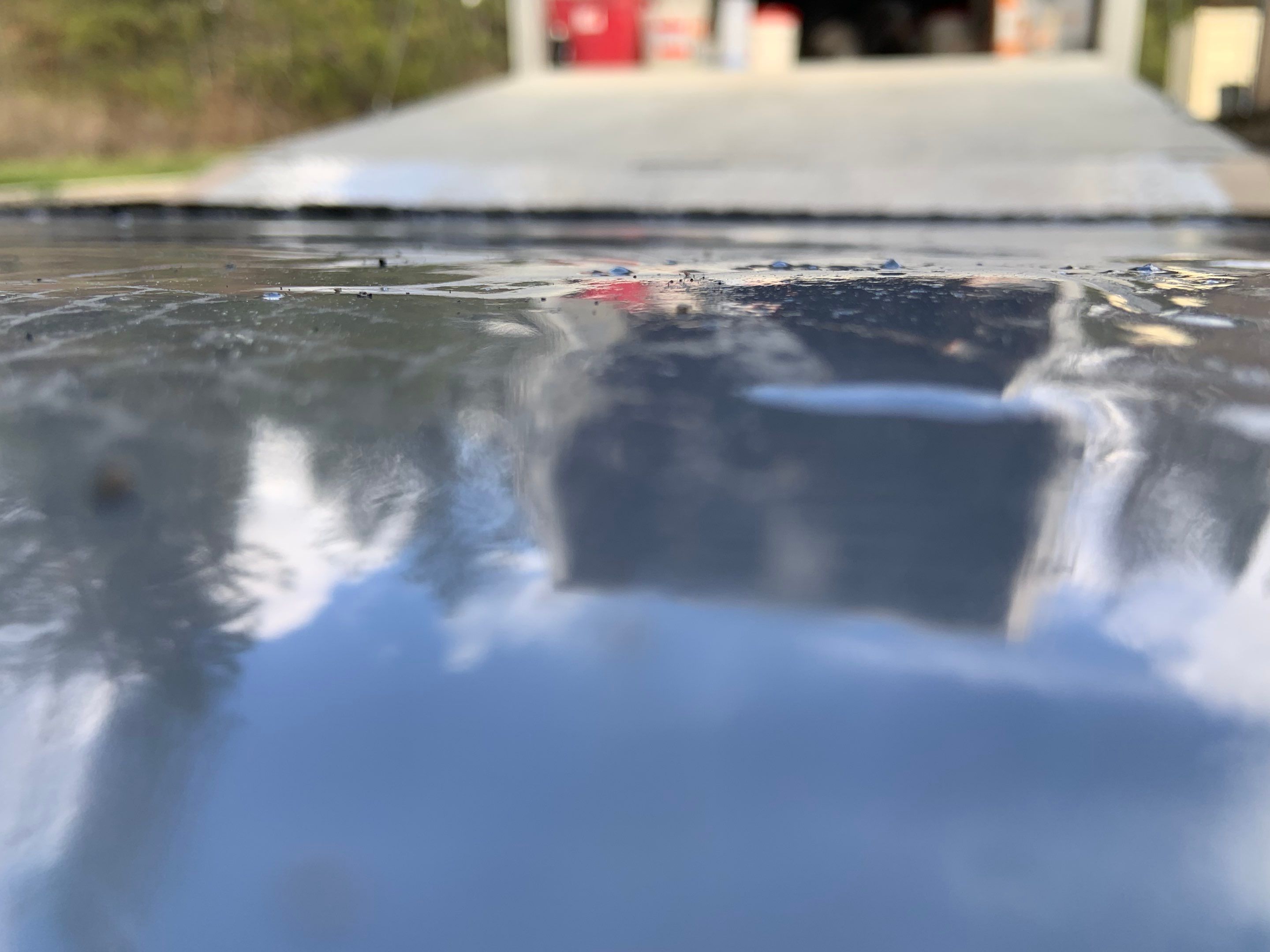 Garage Transformation using Domino for Garage and Pecan for Pool Deck by Croc Coatings, LLC