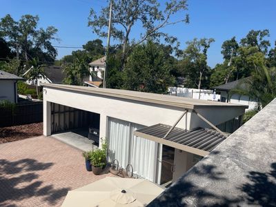 Residential Flat Roof Membrane and Tile Accents in Winter Park