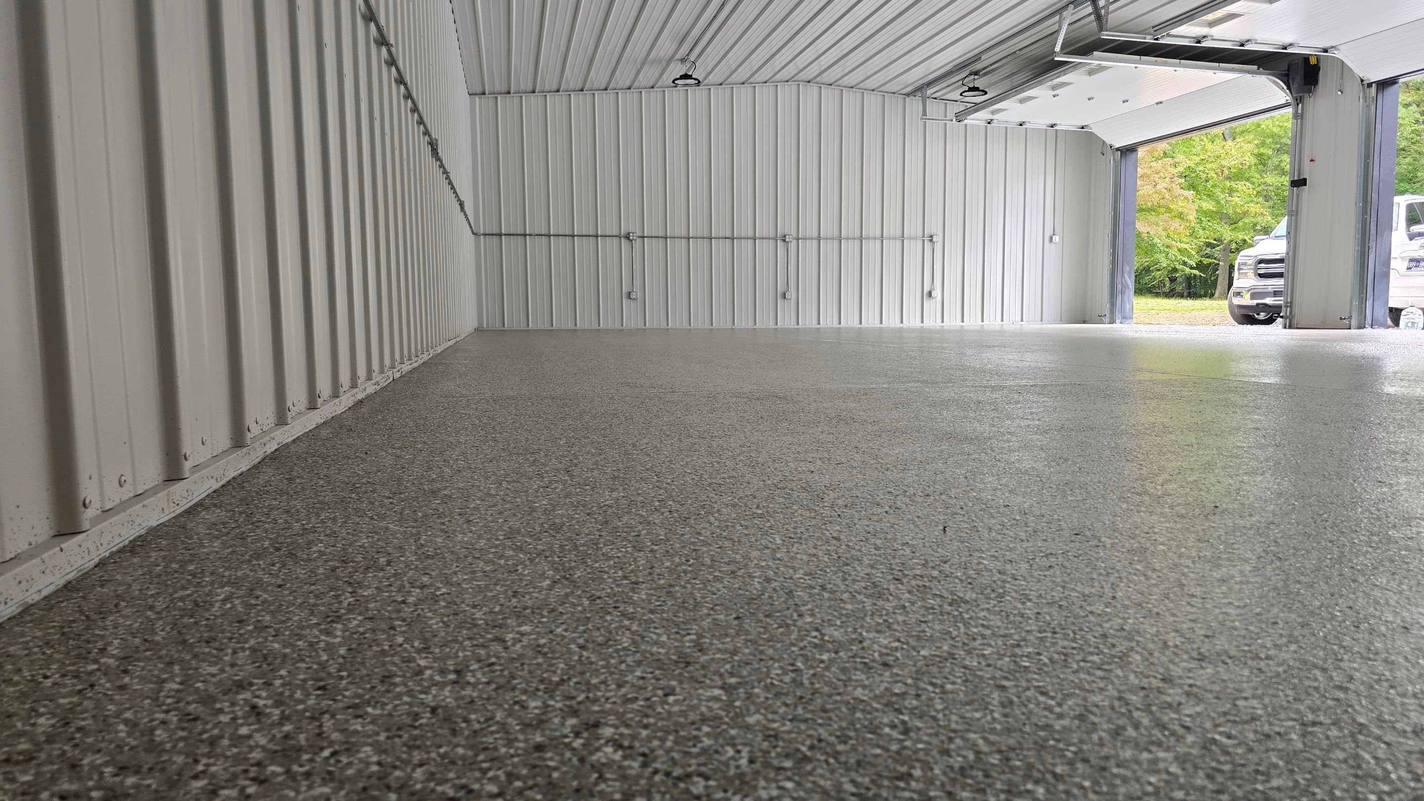 Garage using Creekbed by Elite Floor Solutions