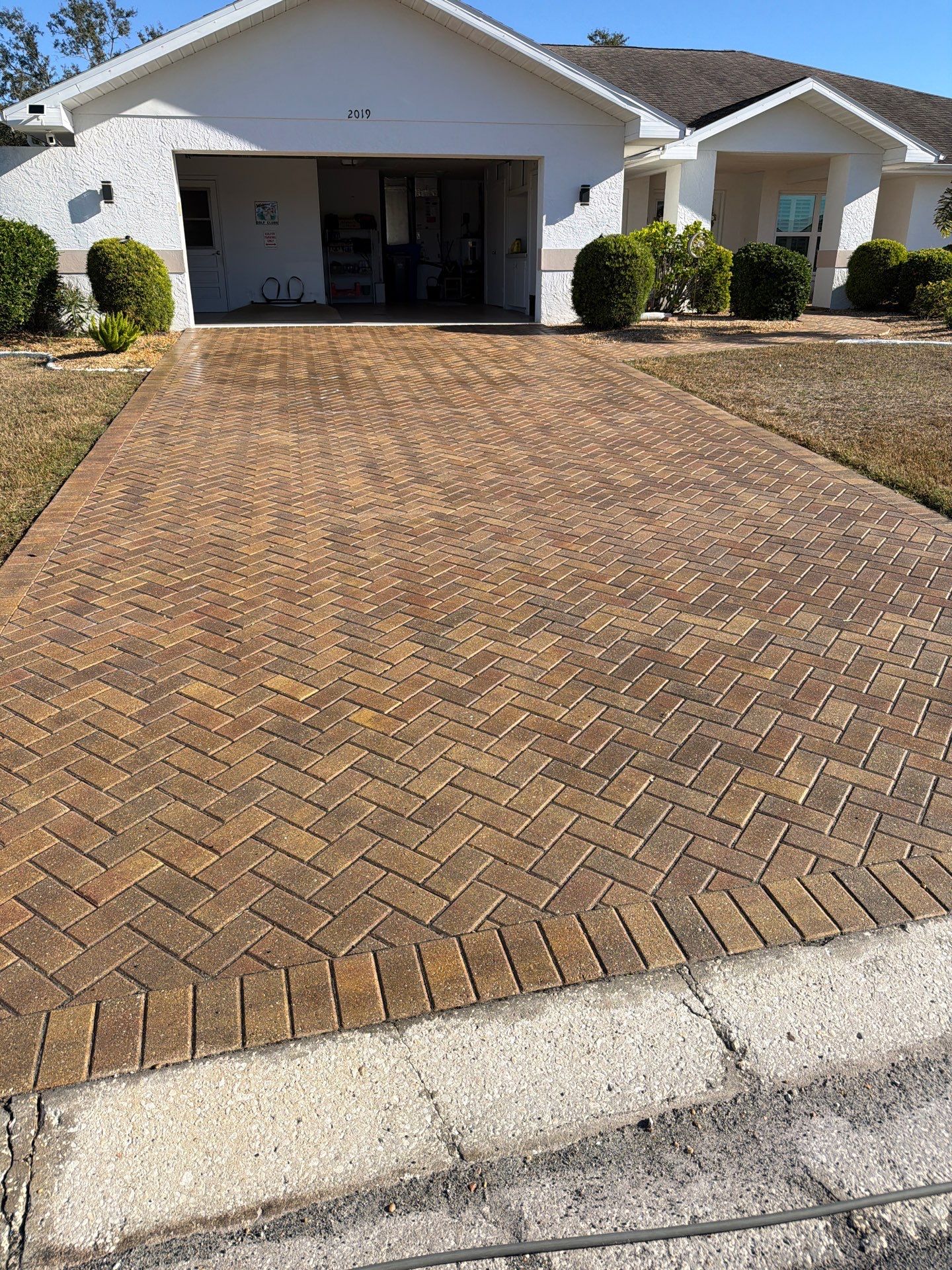 Restoring Herringbone Paver Driveway and Walkway in Sun City Center by Supreme Paver Experts
