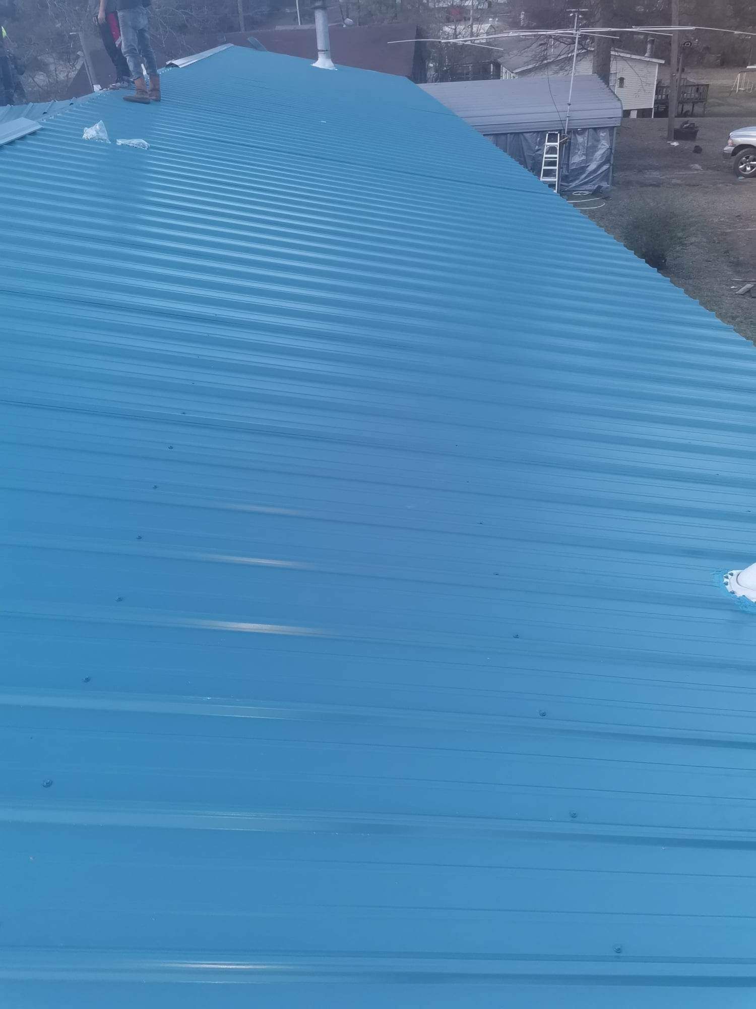 Residential Roofing Installation using 29 gauge metal by Hostetler Roofing