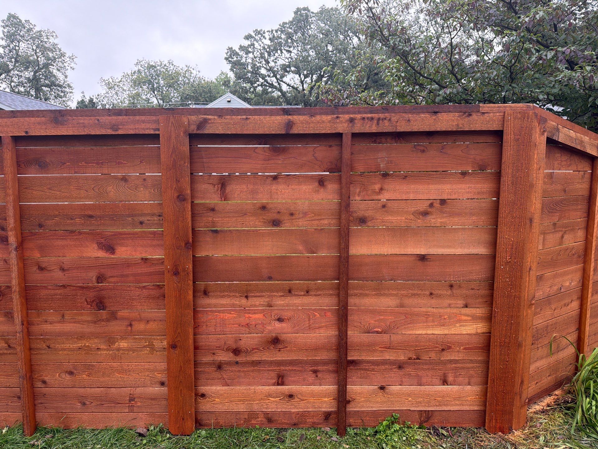 Stained Horizontal Cedar Wood Privacy Fence in Cedar Falls by Perfect Picket Fence and Stain